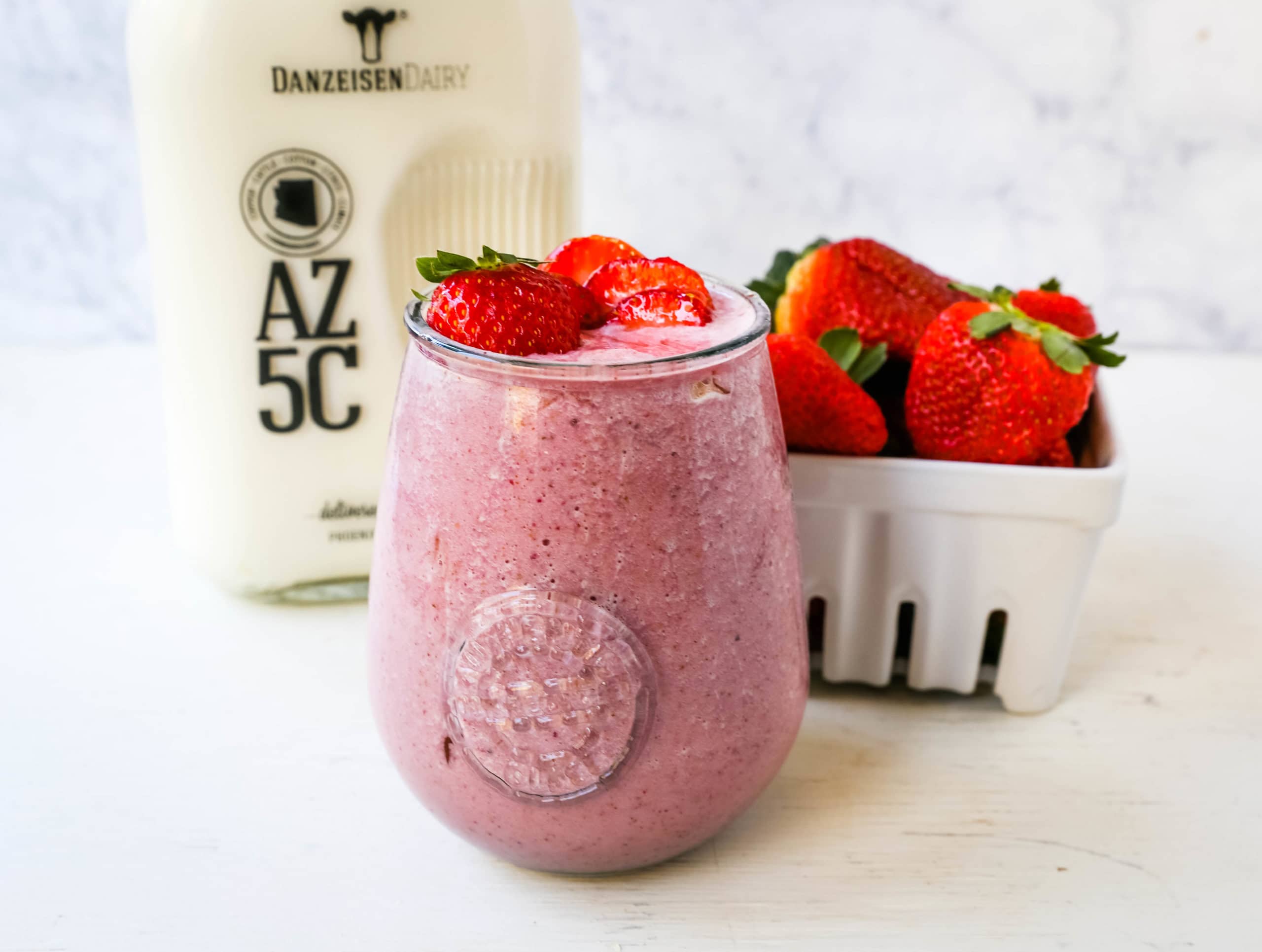 Strawberry Banana Smoothie. Creamy strawberry banana smoothie made with strawberries, bananas, your favorite type of milk, honey, and almond butter (if you want it extra rich and creamy). www.modernhoney.com #smoothie #smoothies #strawberrysmoothie
