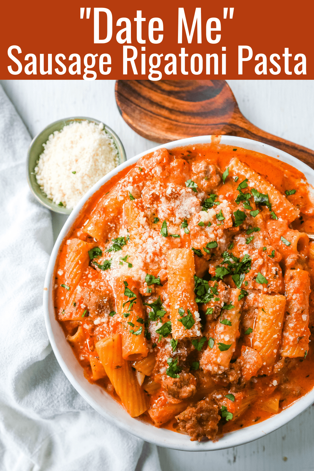 "Date Me" Creamy Sausage Rigatoni Pasta Homemade rich and creamy tomato cream and sausage sauce tossed with rigatoni and topped with parmesan cheese. The best creamy sausage rigatoni pasta! #pasta #dinner