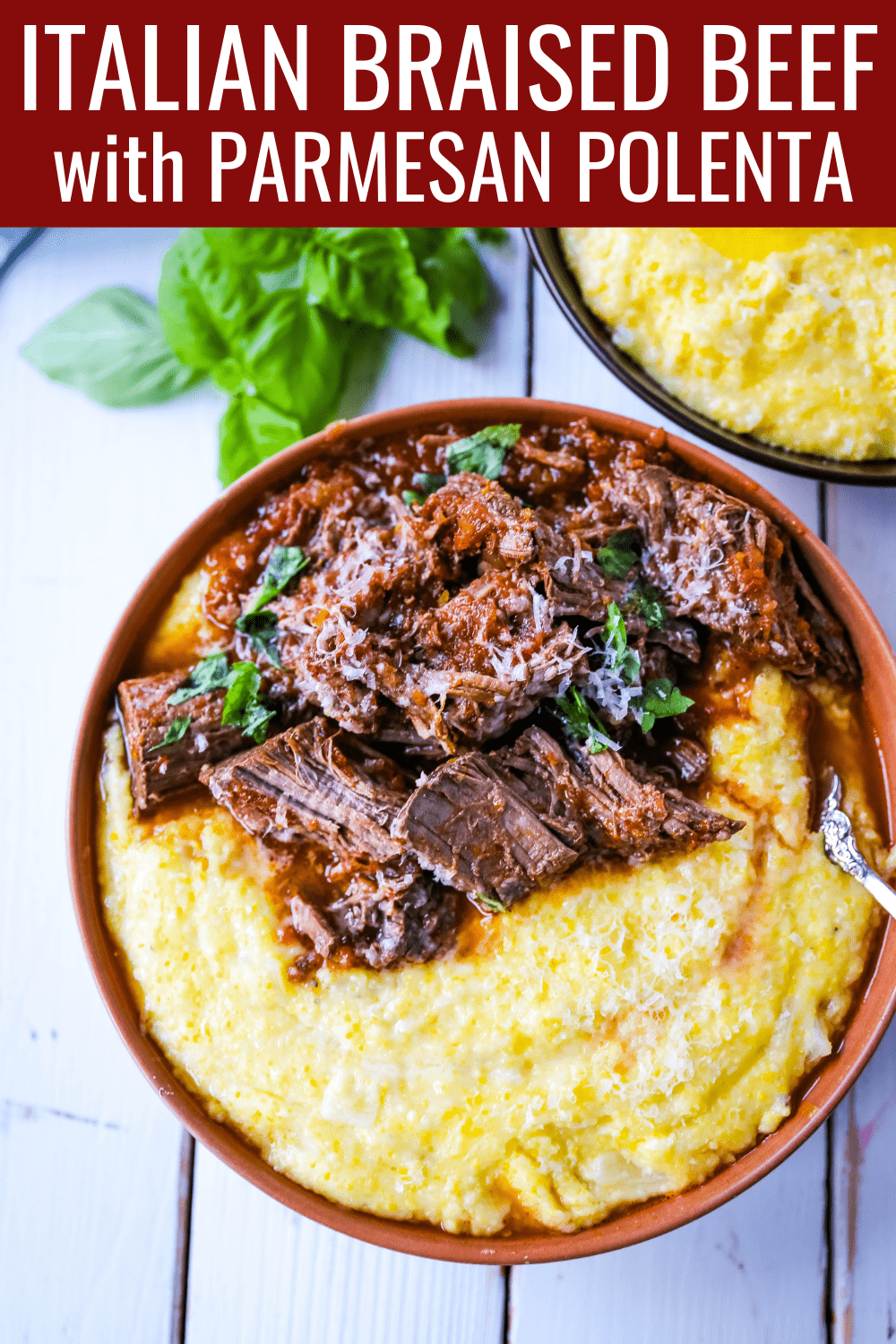 Italian Braised Beef Ragu with Parmesan Polenta Slow-cooked braised beef in a hearty homemade Italian tomato garlic sauce on top of creamy parmesan polenta. A true comfort food! www.modernhoney.com #ragu #italian #italianfood #polenta #beef #slowcooker