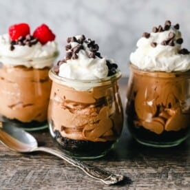 Chocolate Nutella Cheesecake Mousse No-Bake 5-Minute Chocolate Nutella Mousse made with only four ingredients -- Nutella, cream cheese, heavy cream, and powdered sugar. www.modernhoney.com #mousse #chocolatemousse #dessert
