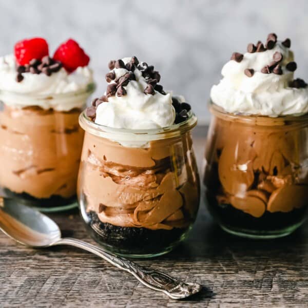 Chocolate Nutella Cheesecake Mousse No-Bake 5-Minute Chocolate Nutella Mousse made with only four ingredients -- Nutella, cream cheese, heavy cream, and powdered sugar.  www.modernhoney.com #mousse #chocolatemousse #dessert