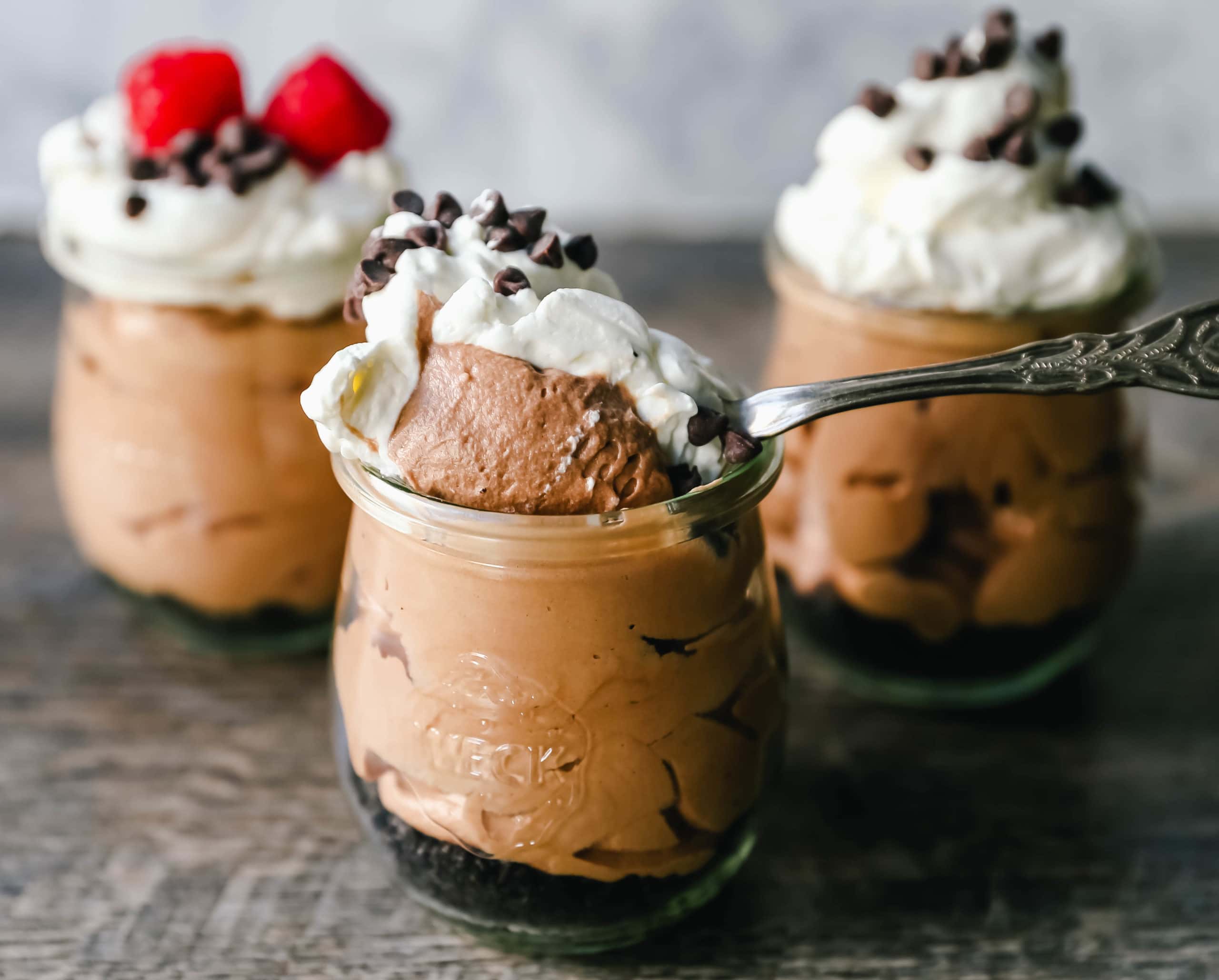 Chocolate Nutella Cheesecake Mousse No-Bake 5-Minute Chocolate Nutella Mousse made with only four ingredients -- Nutella, cream cheese, heavy cream, and powdered sugar.  www.modernhoney.com #mousse #chocolatemousse #dessert