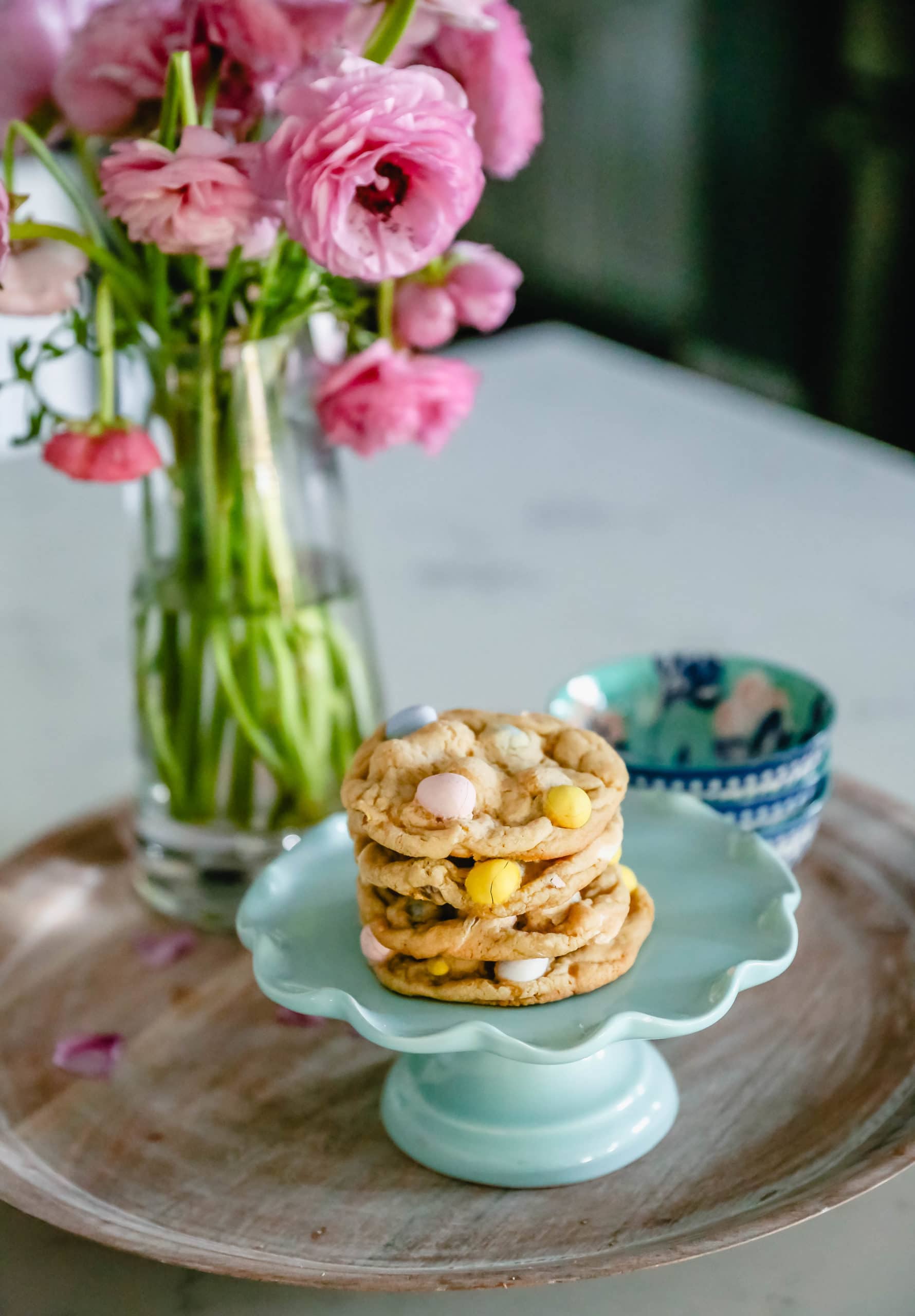 Chocolate Cadbury Egg Cookies A White Chocolate Chip and Famous Chocolate Mini Cadbury Eggs Cookie. Soft and chewy centers with crispy edges and decadent mini Cadbury eggs. A perfect Easter cookie! www.modernhoney.com #cookie #cookies #eastercookie #cadburyeggs