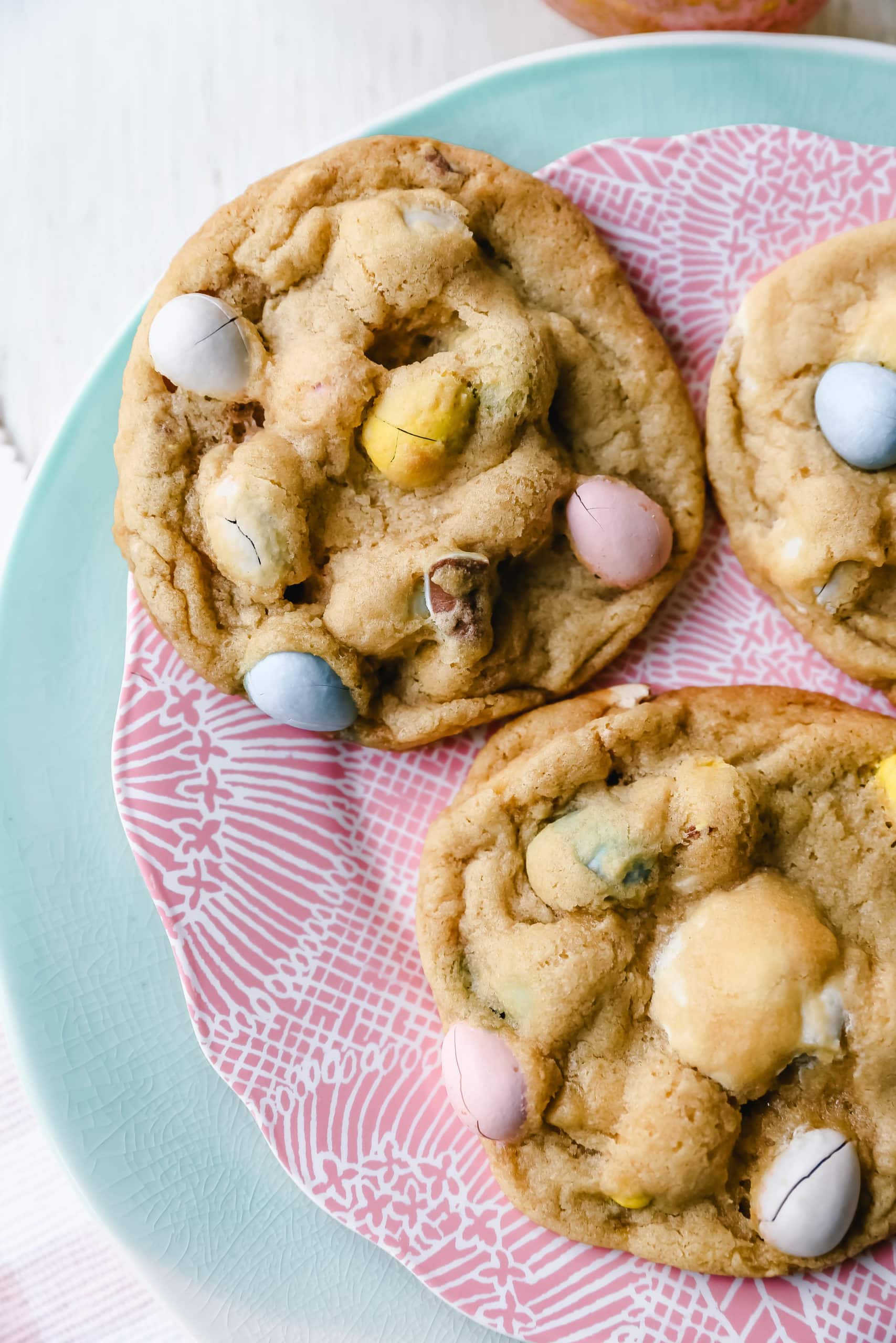 Chocolate Cadbury Egg Cookies A White Chocolate Chip and Famous Chocolate Mini Cadbury Eggs Cookie. Soft and chewy centers with crispy edges and decadent mini Cadbury eggs. A perfect Easter cookie! www.modernhoney.com #cookie #cookies #eastercookie #cadburyeggs