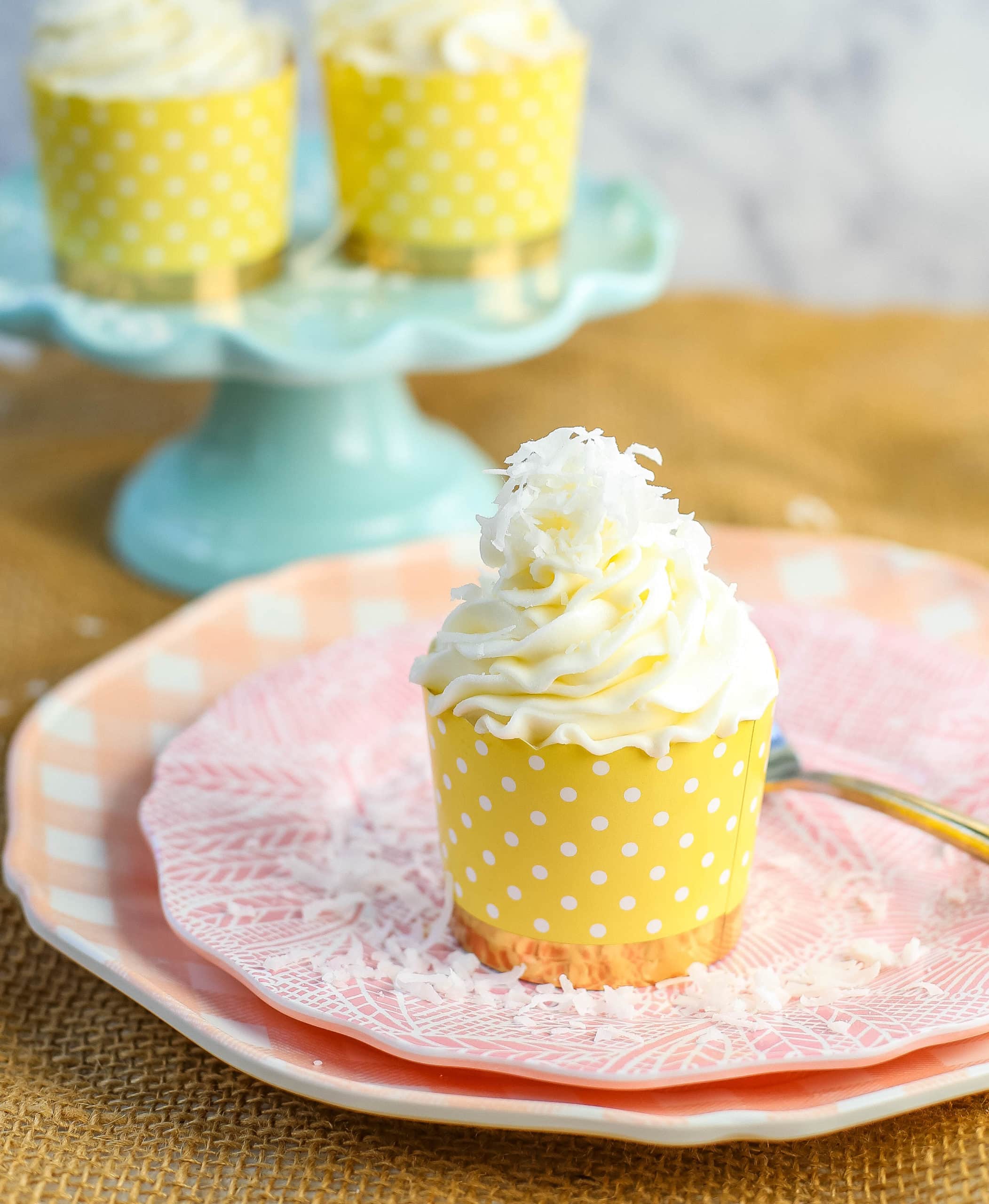 Coconut Cupcakes Moist coconut cupcakes with a secret ingredient to keep them extra soft and tender with a sweet coconut cream cheese frosting. www.modernhoney.com #coconutcupcakes #cupcakes #cupcake #coconutcupcake