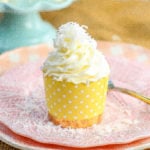 Coconut Cupcakes Moist coconut cupcakes with a secret ingredient to keep them extra soft and tender with a sweet coconut cream cheese frosting. www.modernhoney.com #coconutcupcakes #cupcakes #cupcake #coconutcupcake