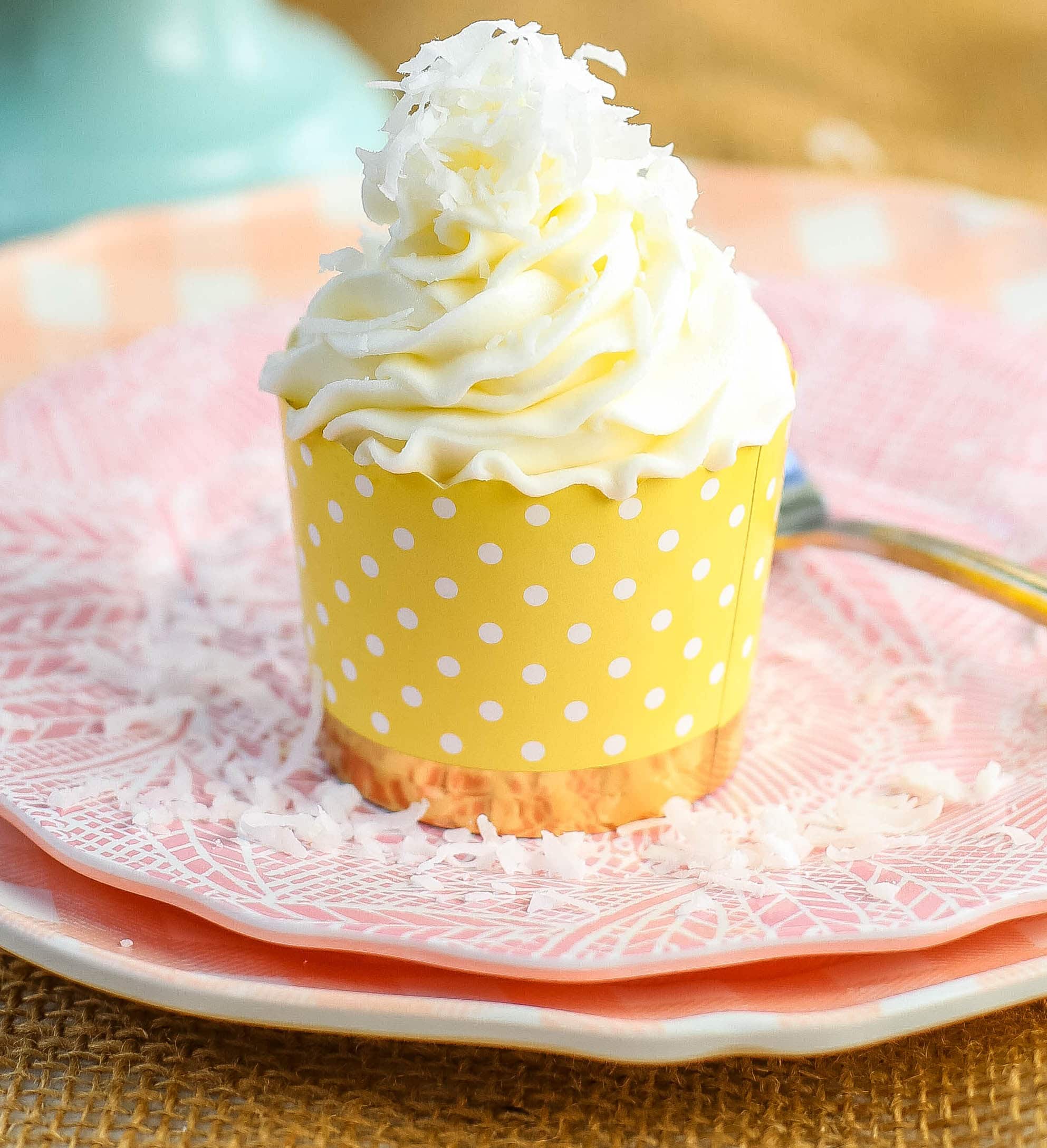 Coconut Cupcakes Moist coconut cupcakes with a secret ingredient to keep them extra soft and tender with a sweet coconut cream cheese frosting. www.modernhoney.com #coconutcupcakes #cupcakes #cupcake #coconutcupcake