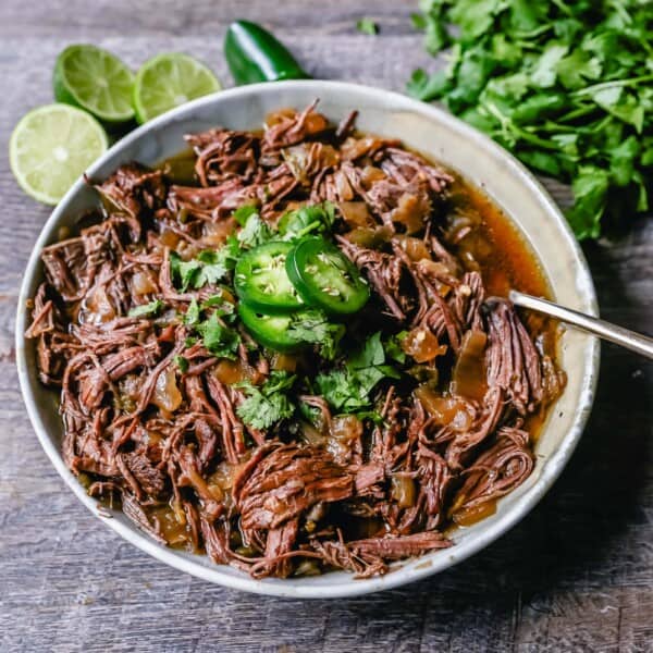 Slow Cooker Barbacoa Beef Tender, flavorful, slow-cooked beef with onions, jalapenos, and spices make this the perfect barbacoa beef for burritos, tacos, enchiladas, quesadillas, on a salad, or just on its own with a few side dishes. 