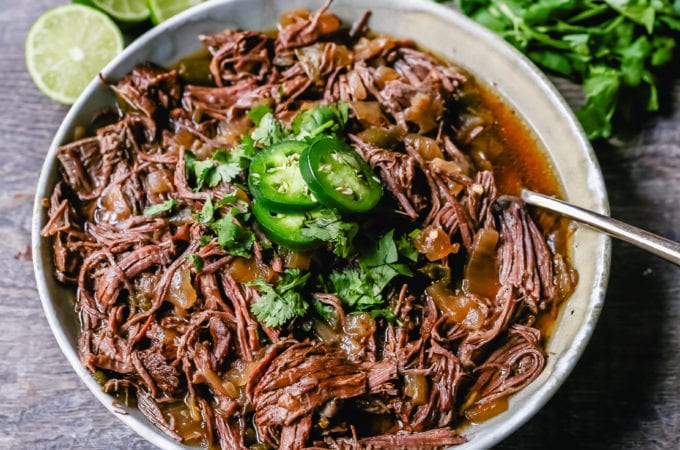 Slow Cooker Barbacoa Beef Tender, flavorful, slow-cooked beef with onions, jalapenos, and spices make this the perfect barbacoa beef for burritos, tacos, enchiladas, quesadillas, on a salad, or just on its own with a few side dishes.