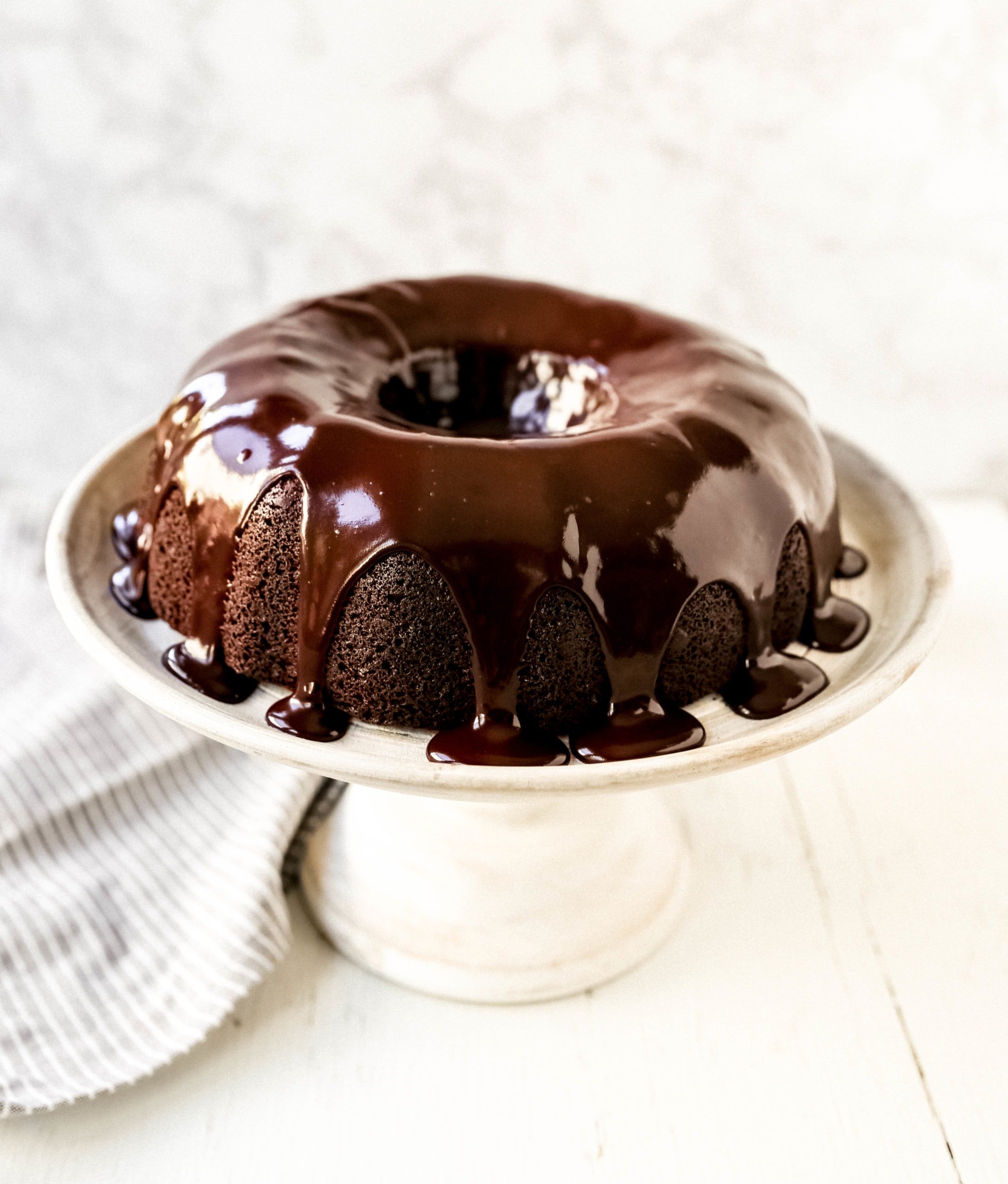 The Best Chocolate Bundt Cake Moist, decadent, rich chocolate bundt cake with a silky chocolate glaze. How to make the perfect chocolate bundt cake recipe! #chocolate #bundtcake #chocolatebundtcake #chocolatecake #cake