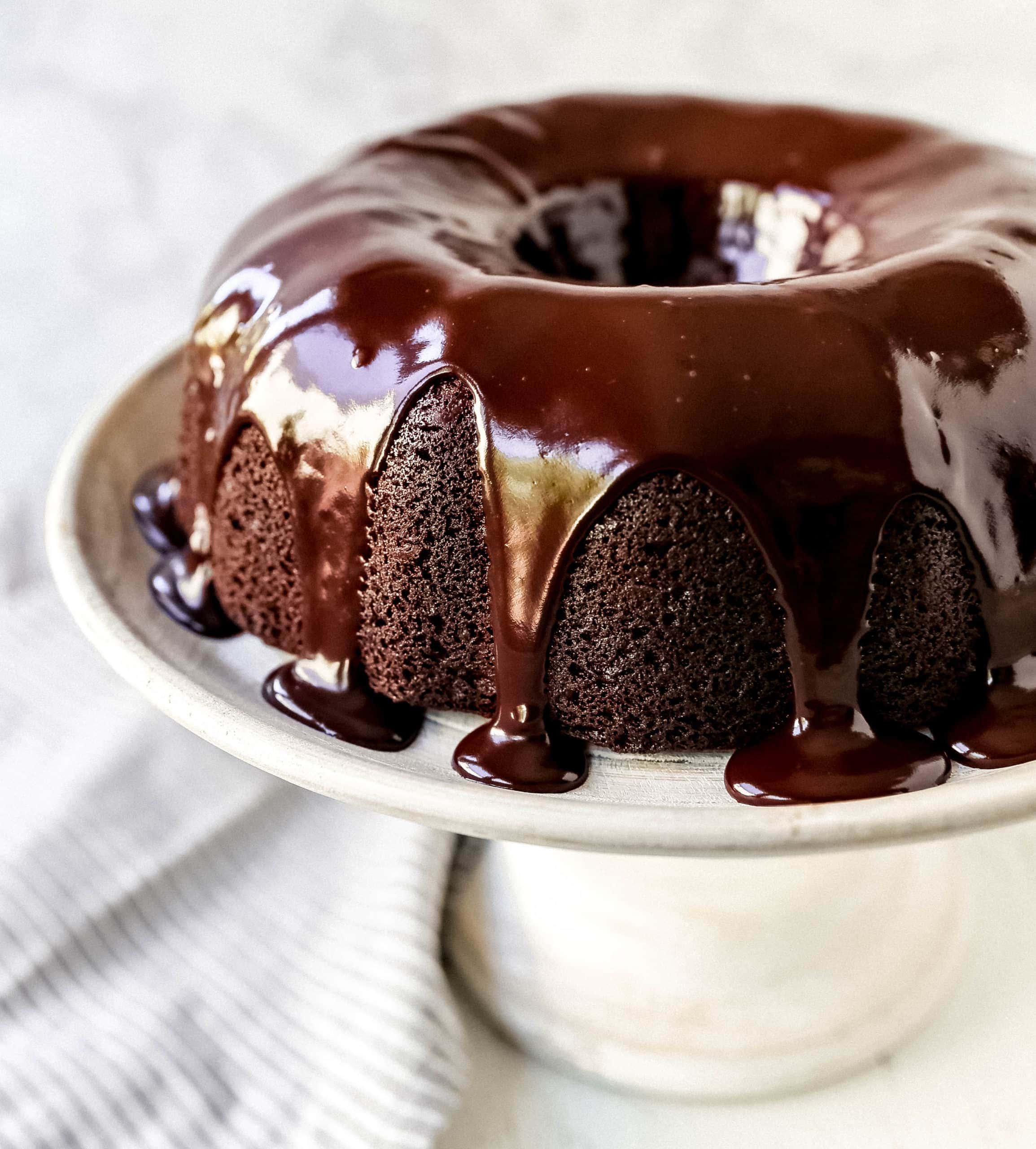 The Best Chocolate Bundt Cake Moist, decadent, rich chocolate bundt cake with a silky chocolate glaze. How to make the perfect chocolate bundt cake recipe! #chocolate #bundtcake #chocolatebundtcake #chocolatecake #cake