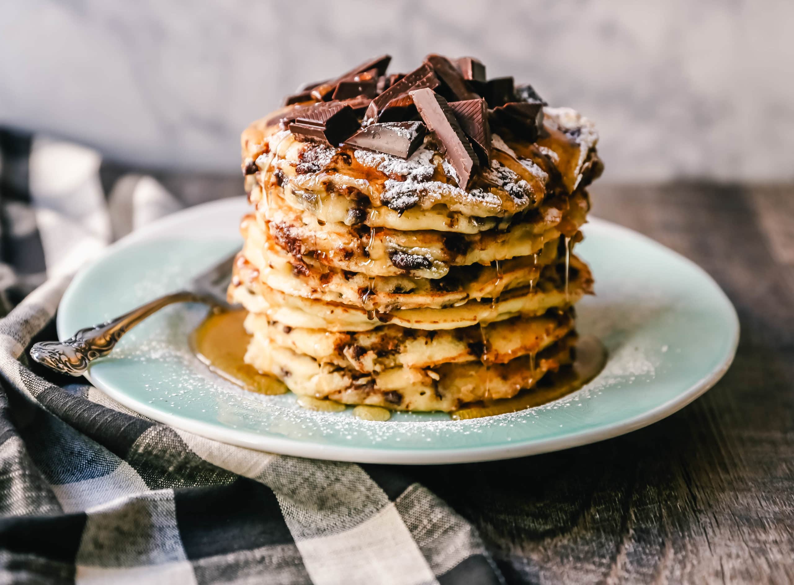 Chocolate Chip Ricotta Pancakes Creamy homemade one-bowl ricotta pancakes with chocolate chips. How to make easy 5-minute chocolate chip ricotta pancakes from scratch! www.modernhoney.com #ricottapancakes #pancakes #chocolatechipricottapancakes