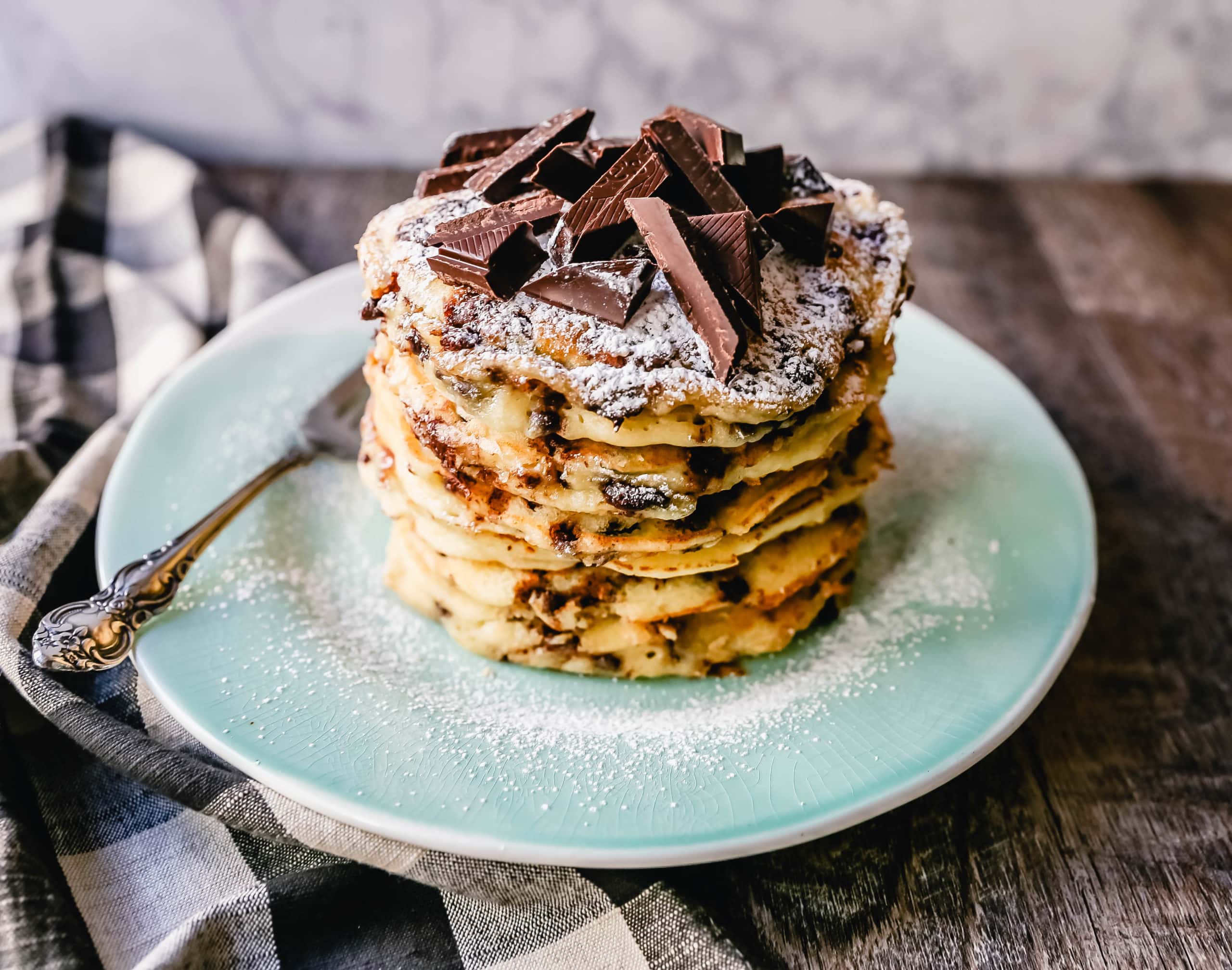 Chocolate Chip Ricotta Pancakes Creamy homemade one-bowl ricotta pancakes with chocolate chips. How to make easy 5-minute chocolate chip ricotta pancakes from scratch! www.modernhoney.com #ricottapancakes #pancakes #chocolatechipricottapancakes