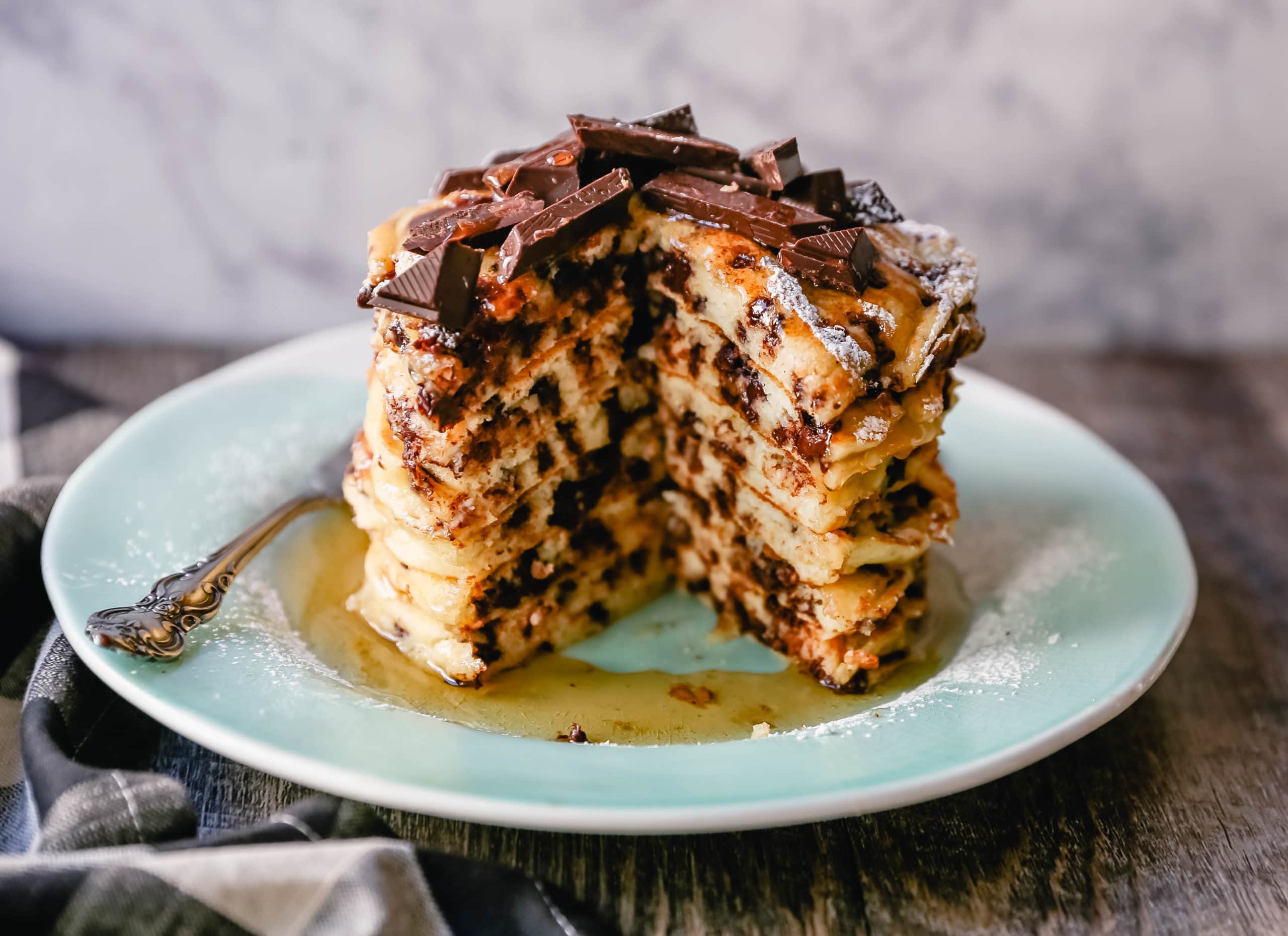 Chocolate Chip Ricotta Pancakes Creamy homemade one-bowl ricotta pancakes with chocolate chips. How to make easy 5-minute chocolate chip ricotta pancakes from scratch! www.modernhoney.com #ricottapancakes #pancakes #chocolatechipricottapancakes