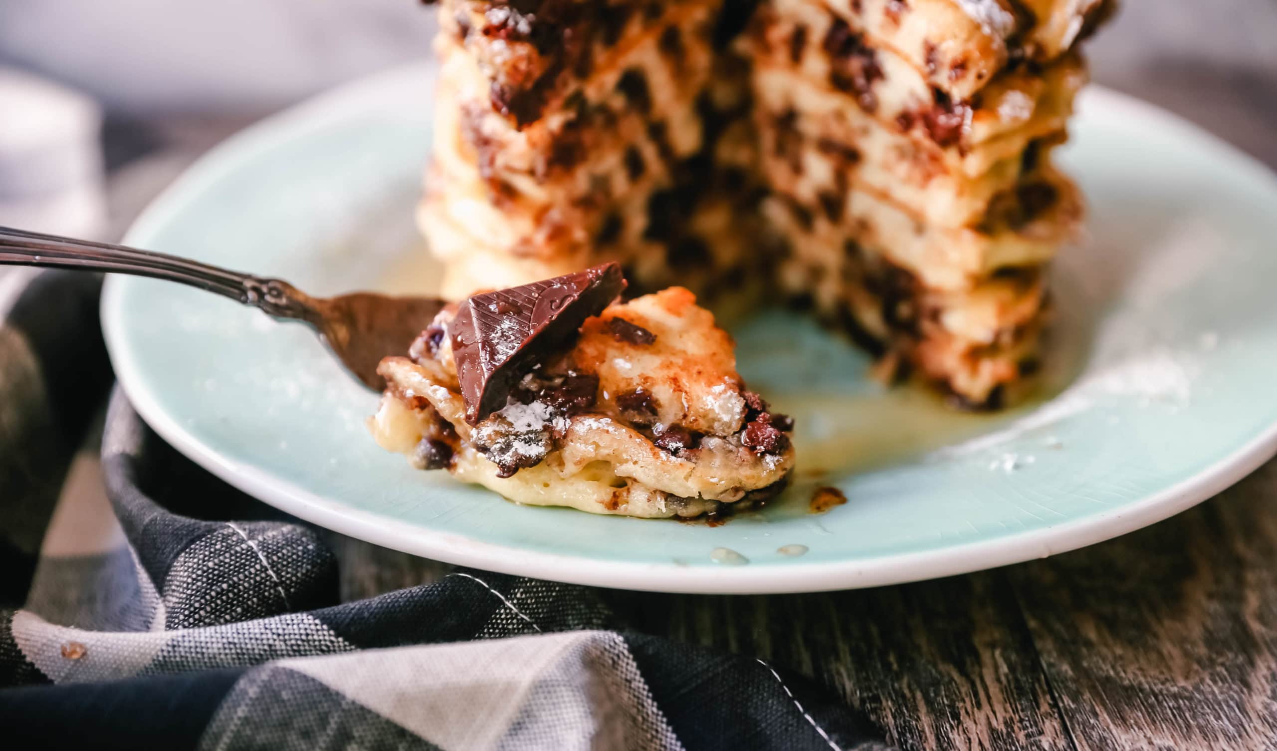 Chocolate Chip Ricotta Pancakes Creamy homemade one-bowl ricotta pancakes with chocolate chips. How to make easy 5-minute chocolate chip ricotta pancakes from scratch! www.modernhoney.com #ricottapancakes #pancakes #chocolatechipricottapancakes