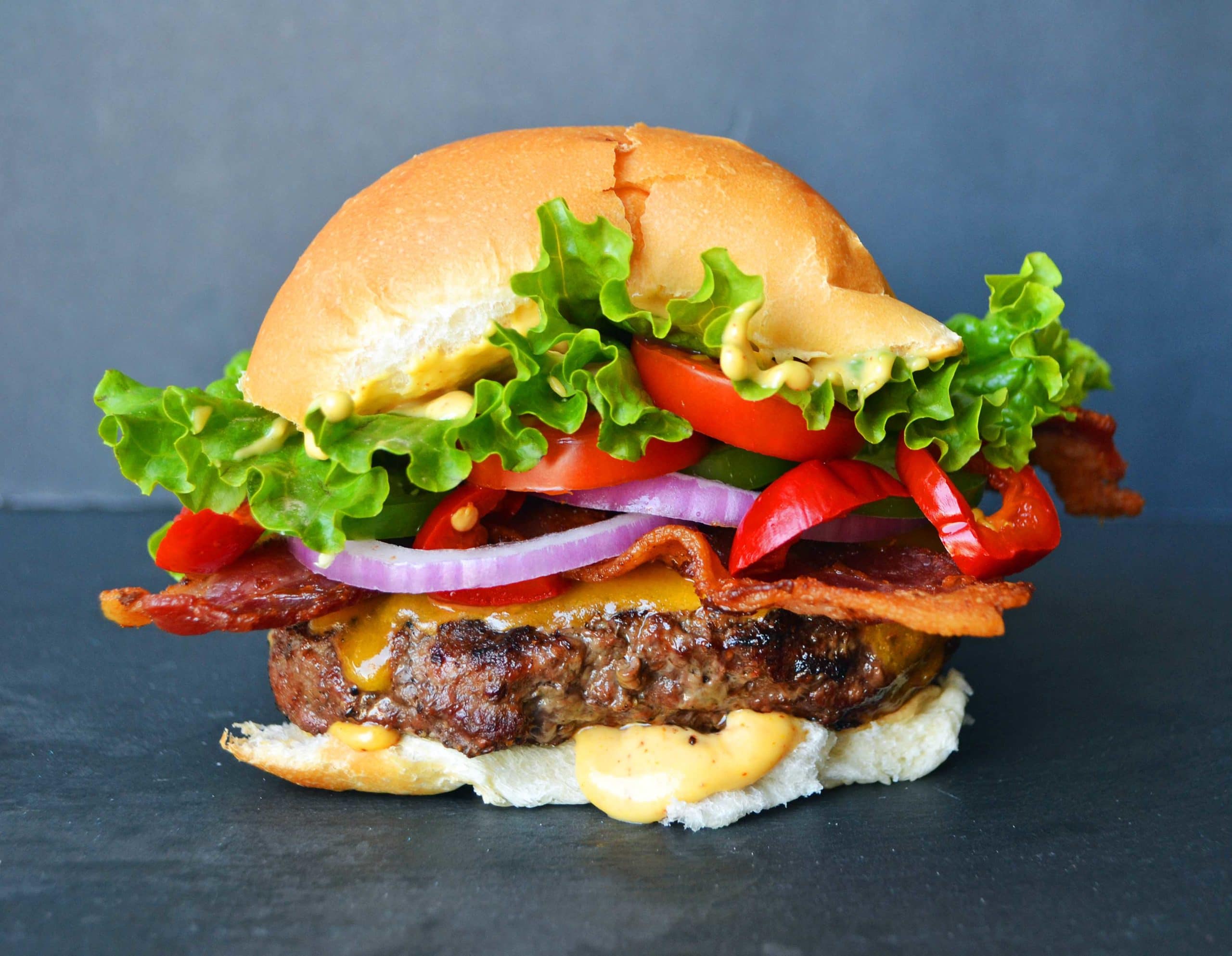 The Ultimate Burger. Tips and tricks for grilling up the perfect burger. How to make the best burger. How to grill a burger. Grilling a burger tips. #grilling #burger #burgers