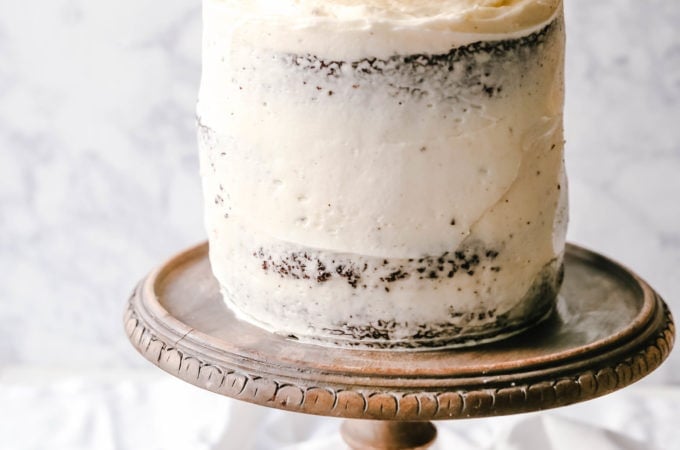 Black and White Cake -- Chocolate Cake with Vanilla Frosting Rich, moist homemade chocolate cake with a creamy vanilla bean frosting with a touch of cream cheese. The perfect Black and White Cake!
