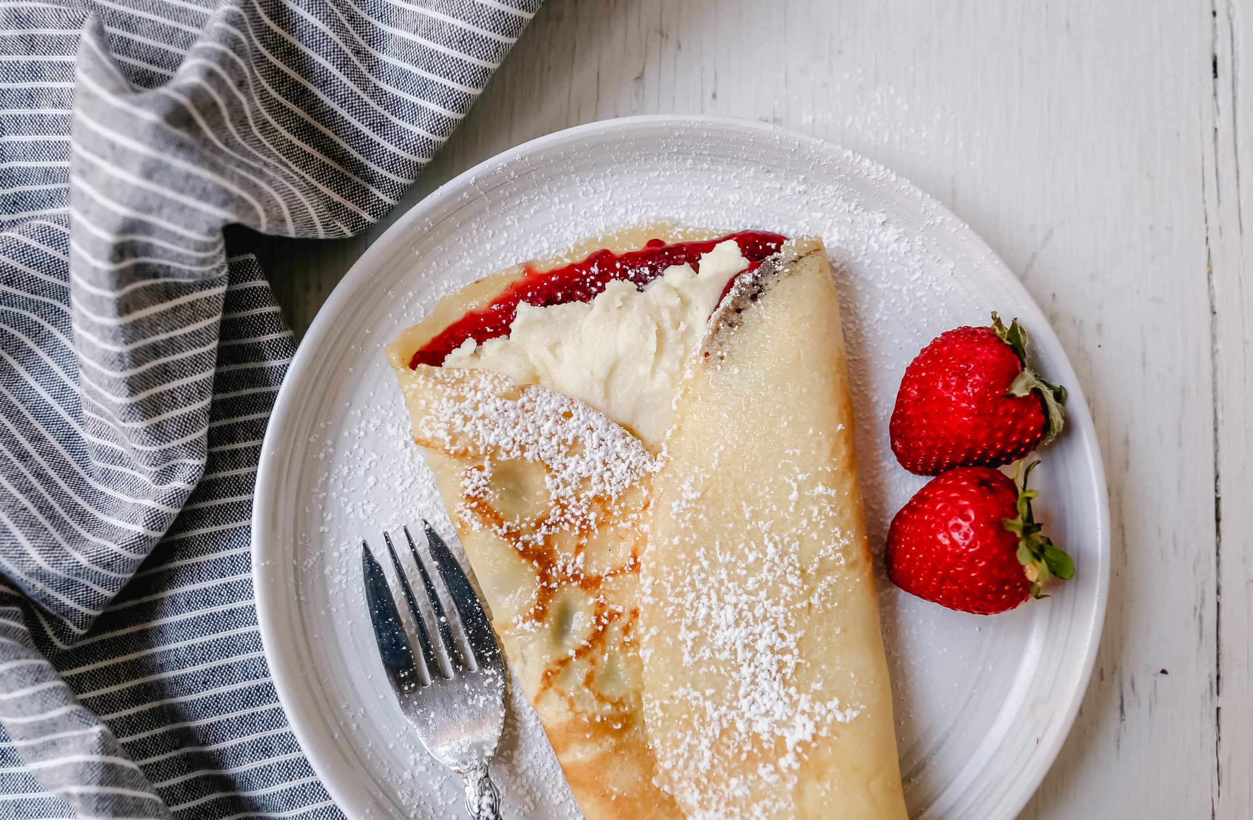 The Best Crepes Recipe. An easy homemade crepe recipe made with simple ingredients -- milk, flour, eggs, sugar, water, and butter. Simple 6-ingredient crepe recipe!  #crepes #crepe #breakfast