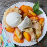 Peach Cobbler. The Best Peach Cobbler Recipe! Fresh peaches tossed with a touch of sugar and topped with a homemade sweet and buttery topping that resembles a mix of a sugar cookie and a sweet biscuit. 