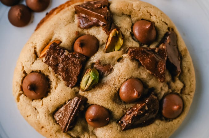 Pistachio Toffee Chocolate Chip Cookies Thick, chewy bakery-style cookies with milk chocolate toffee, pistachios, and milk chocolate chips. A sweet and salty cookie!