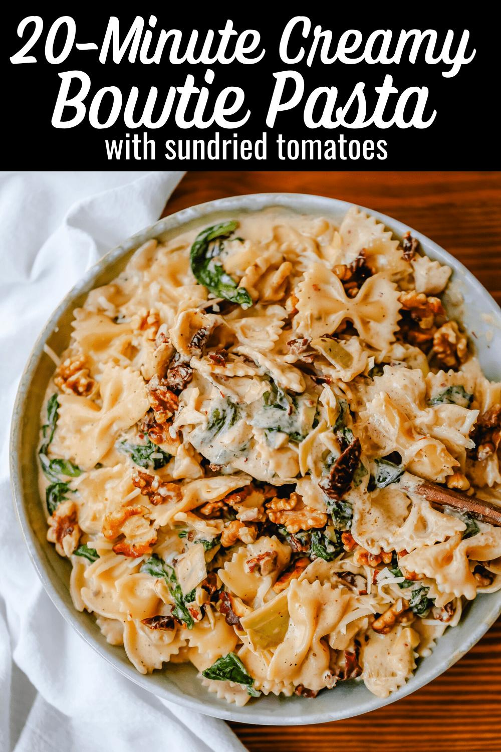 Creamy Bowtie Pasta with Sundried Tomatoes Bowtie Pasta tossed with a garlic sundried tomato cream sauce with artichoke hearts and parmesan cheese and crunchy toasted walnuts. A quick 20-minute weeknight meal. #pasta #dinner