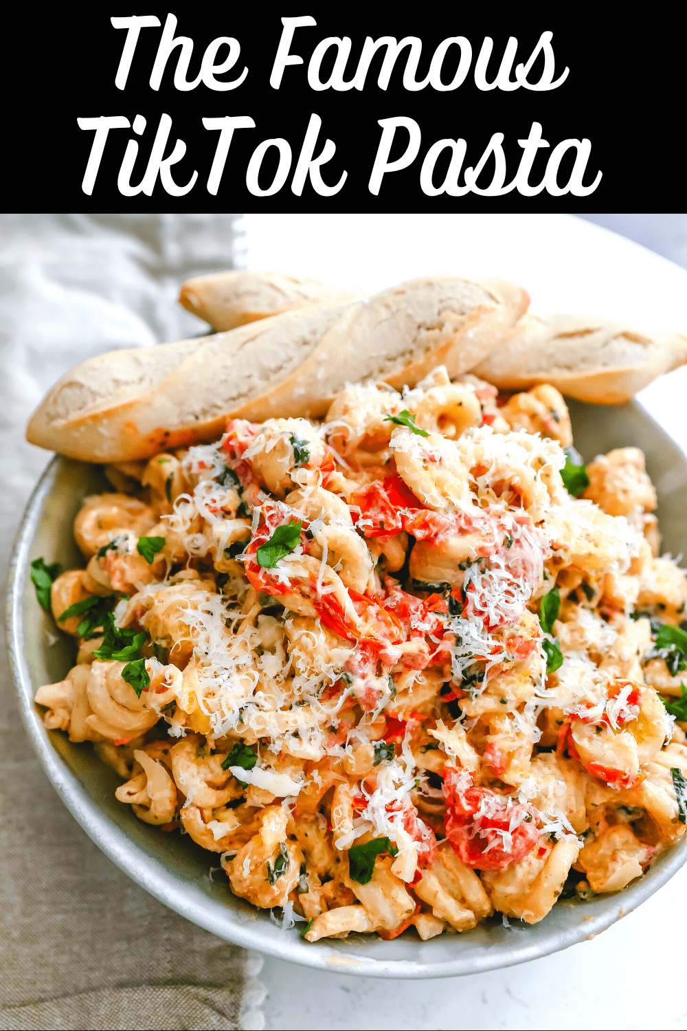 Boursin Cheese Baked TikTok Pasta Freshly cooked pasta tossed with baked Boursin cheese, tomatoes, garlic, spices, and parmesan cheese. This easy-baked pasta recipe will knock your socks off! #pasta #bakedpasta #tiktokpasta