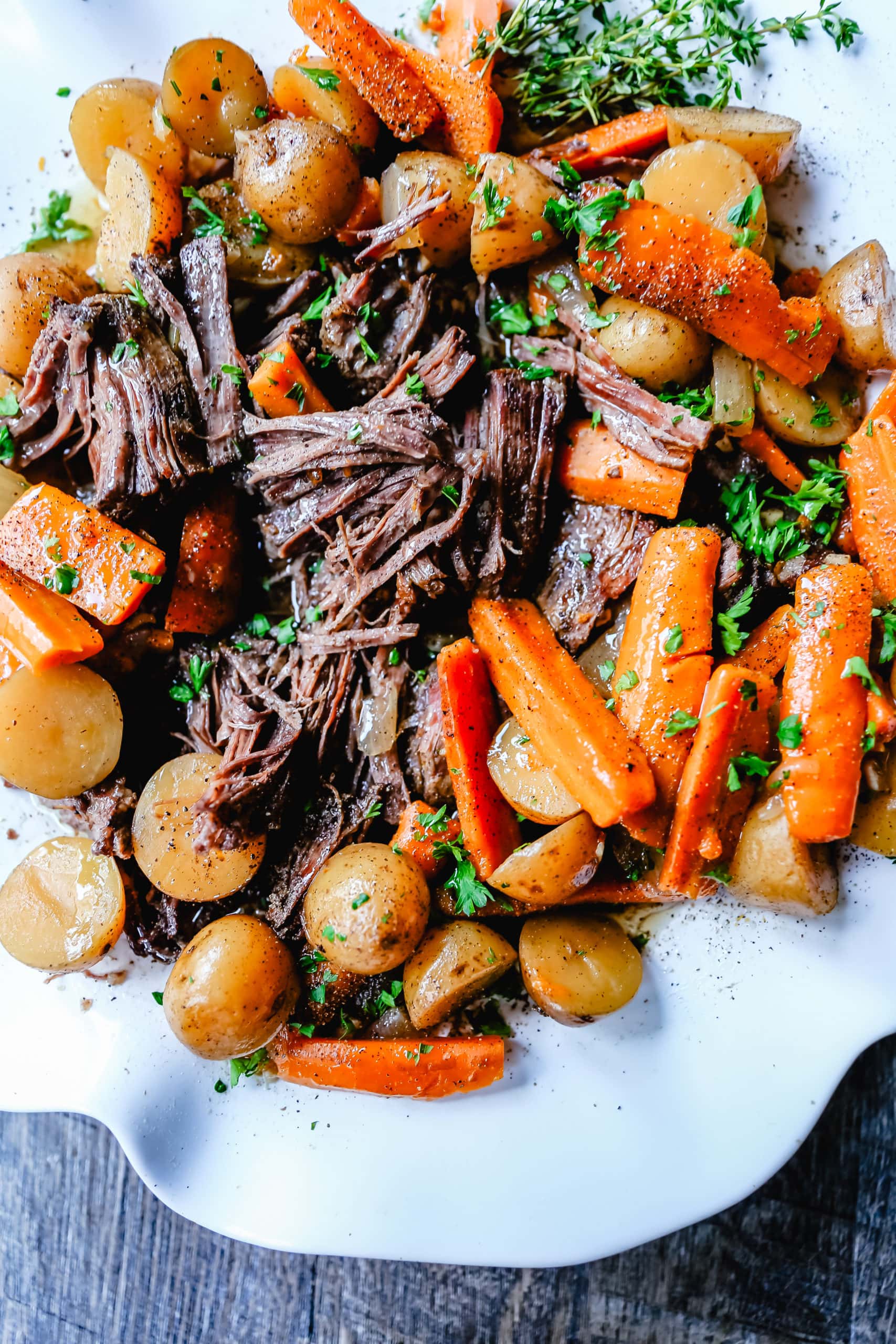 Beef Pot Roast Tender, slow-cooked, flavorful beef pot roast with golden potatoes and savory carrots. How to make the most flavorful, moist, and tender pot roast at home.