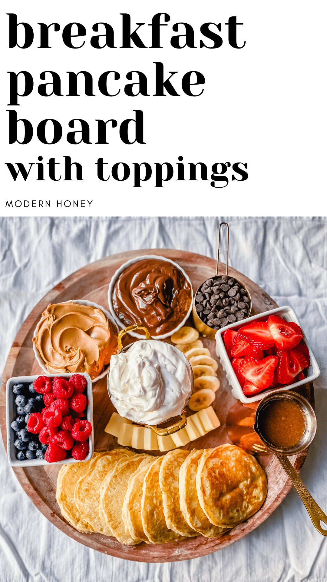 Breakfast Pancake Board. The perfect breakfast for entertaining! Homemade buttermilk pancakes topped with all of your favorite toppings -- fresh berries, whipped cream, homemade syrup, Nutella, chocolate chips, peanut butter, and more. 