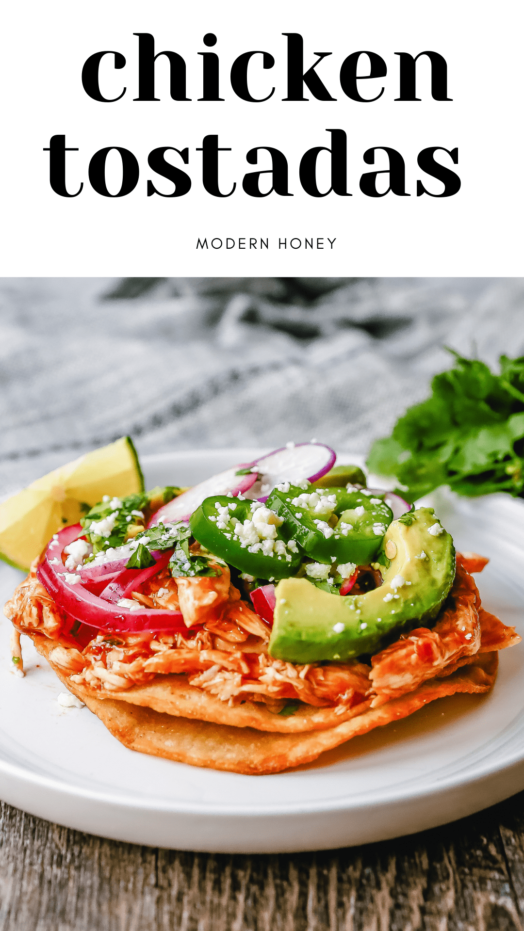 Chicken Tostadas Chile Chicken Tostadas made with homemade tostada shells topped with chile spiced chicken topped with cotija cheese, cilantro, pickled red onion, fresh avocado, and jalapeños.