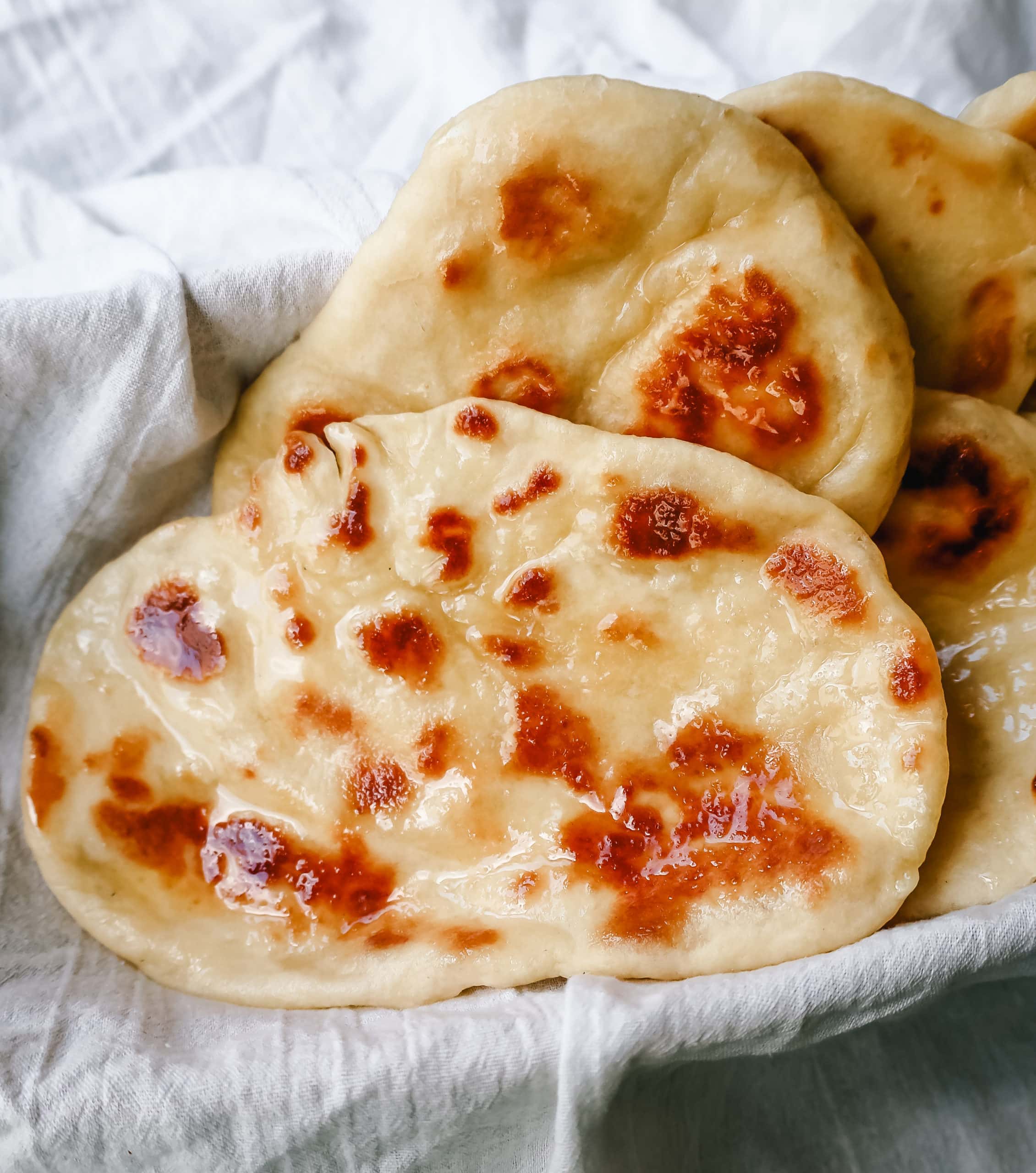 Homemade Naan Bread Light, fluffy, buttery homemade Naan bread that is even better than what you find in restaurants. 