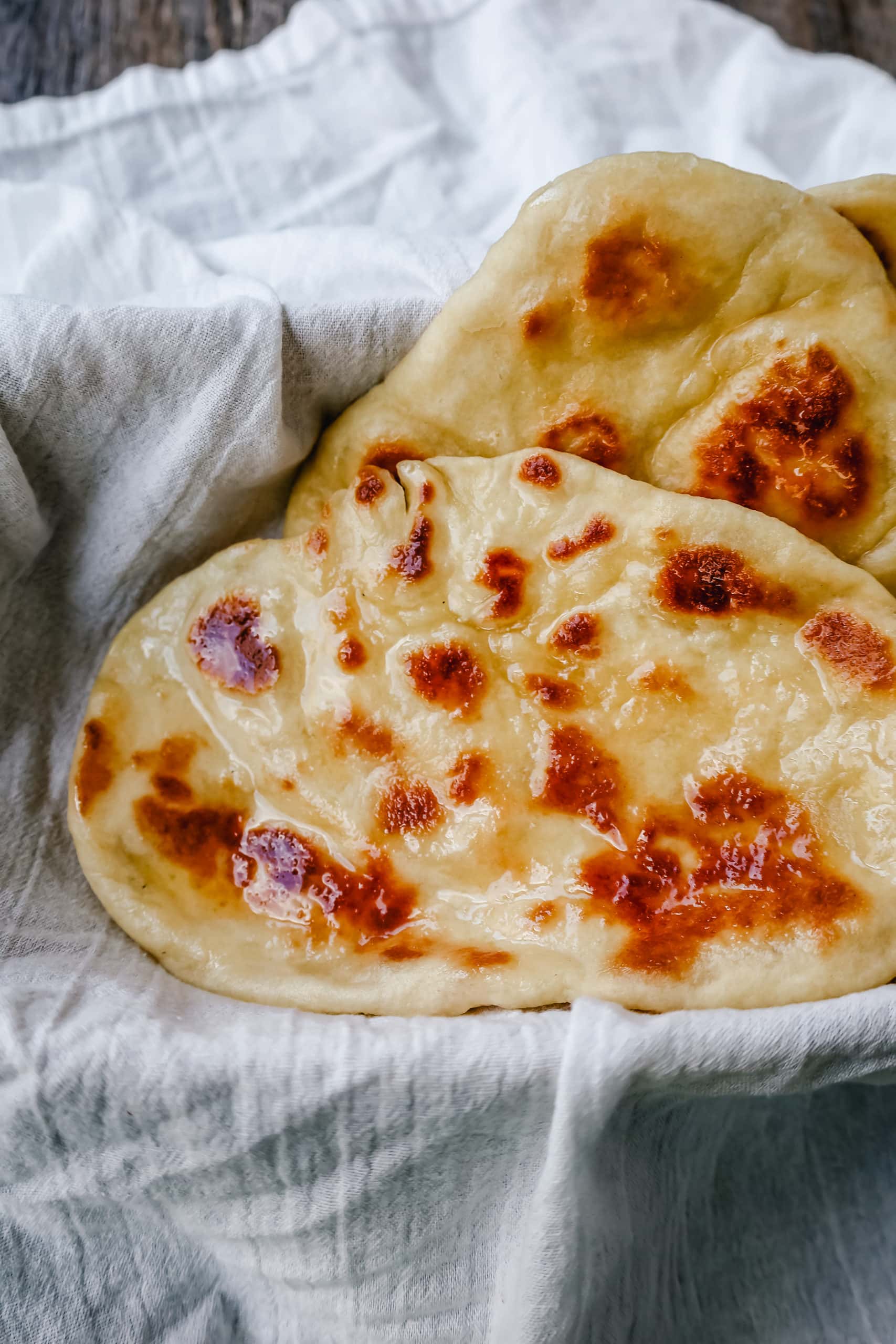 Homemade Naan Bread Light, fluffy, buttery homemade Naan bread that is even better than what you find in restaurants. 