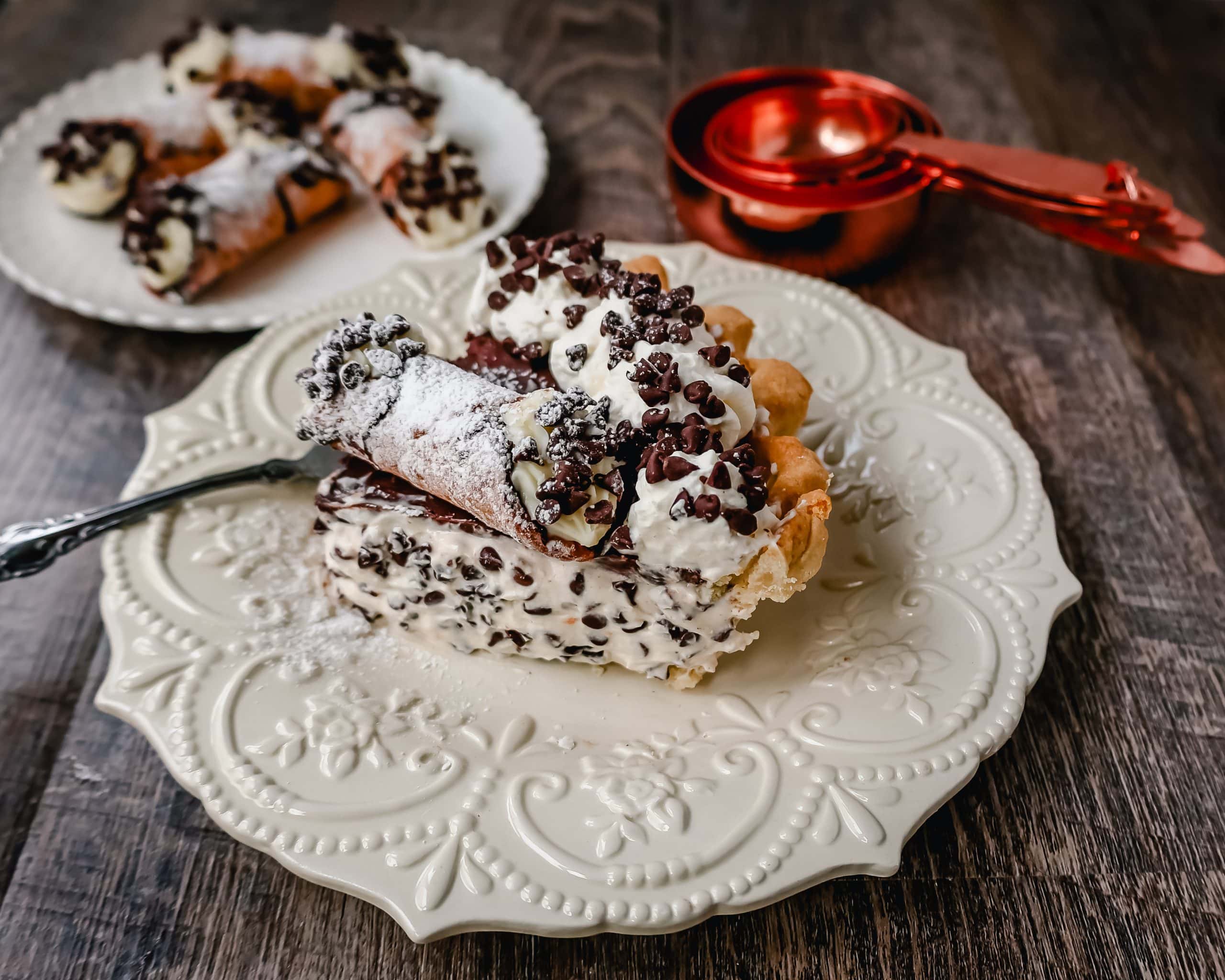 Best Cannoli Pie Recipe The popular Italian dessert -- the famous Cannoli -- but made into a pie. A creamy sweet ricotta and cream cheese filling with mini chocolate chips, topped with chocolate ganache, and freshly whipped cream.