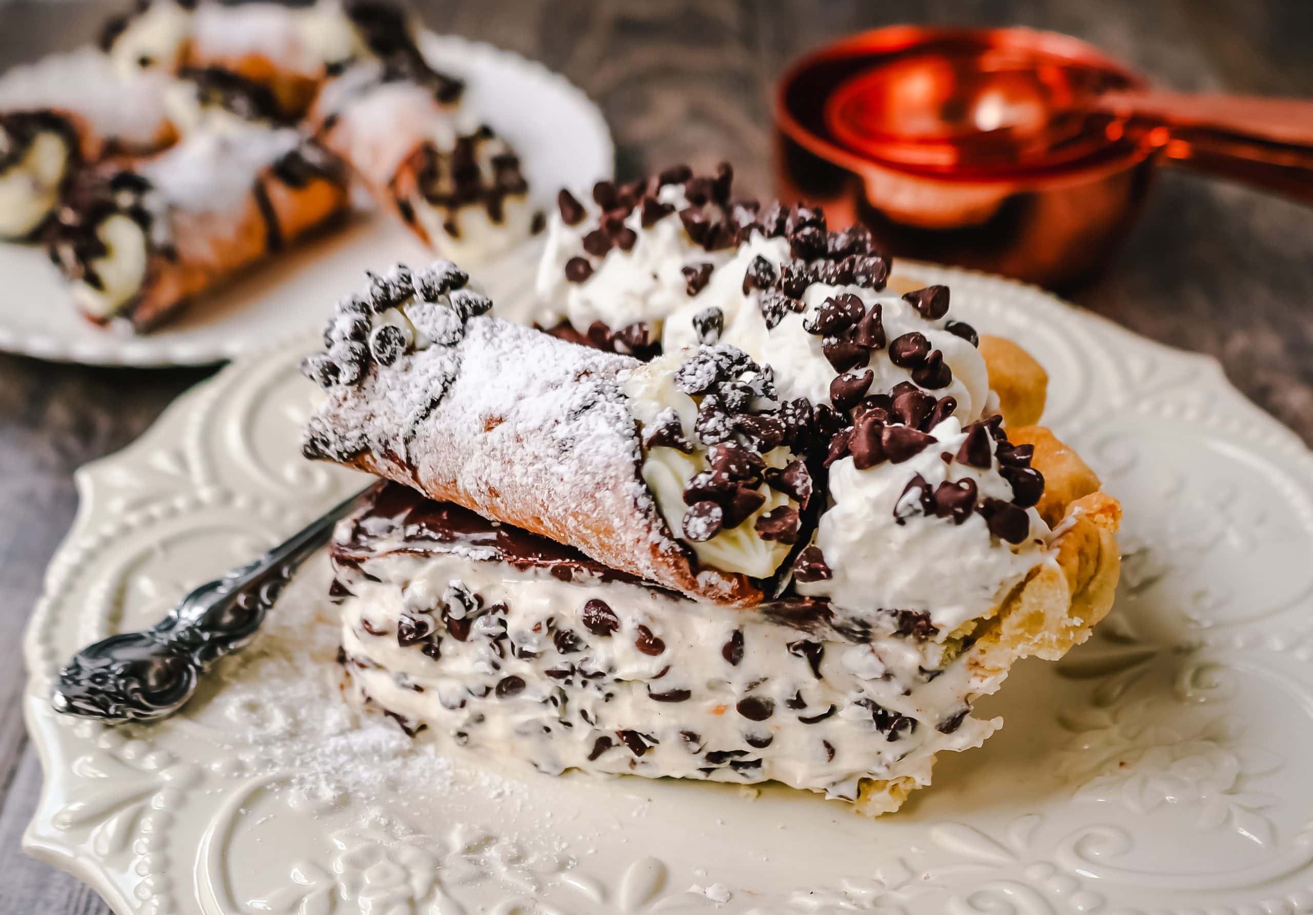 Best Cannoli Pie Recipe The popular Italian dessert -- the famous Cannoli -- but made into a pie. A creamy sweet ricotta and cream cheese filling with mini chocolate chips, topped with chocolate ganache, and freshly whipped cream.