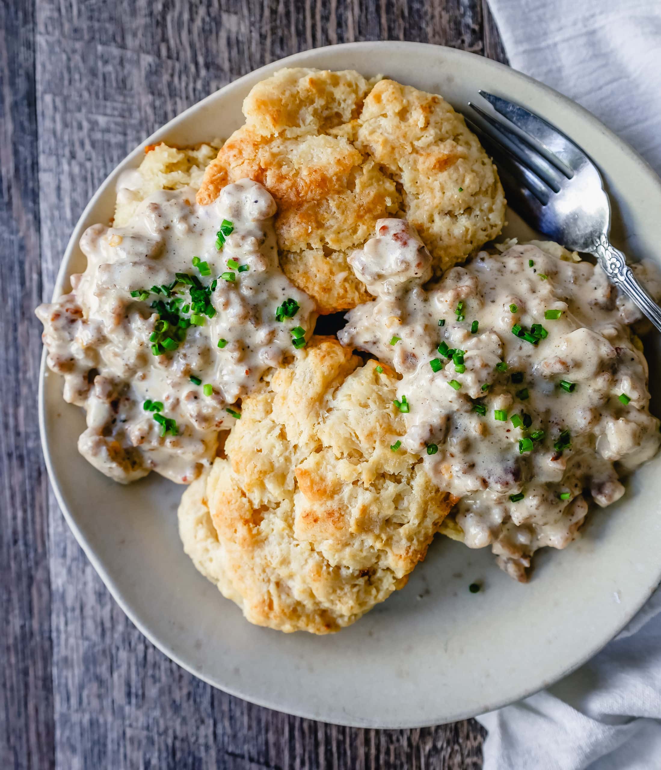 Homemade Biscuits and Gravy Buttery, flaky homemade biscuits topped with a creamy, savory sausage gravy. The best biscuits and gravy recipe!