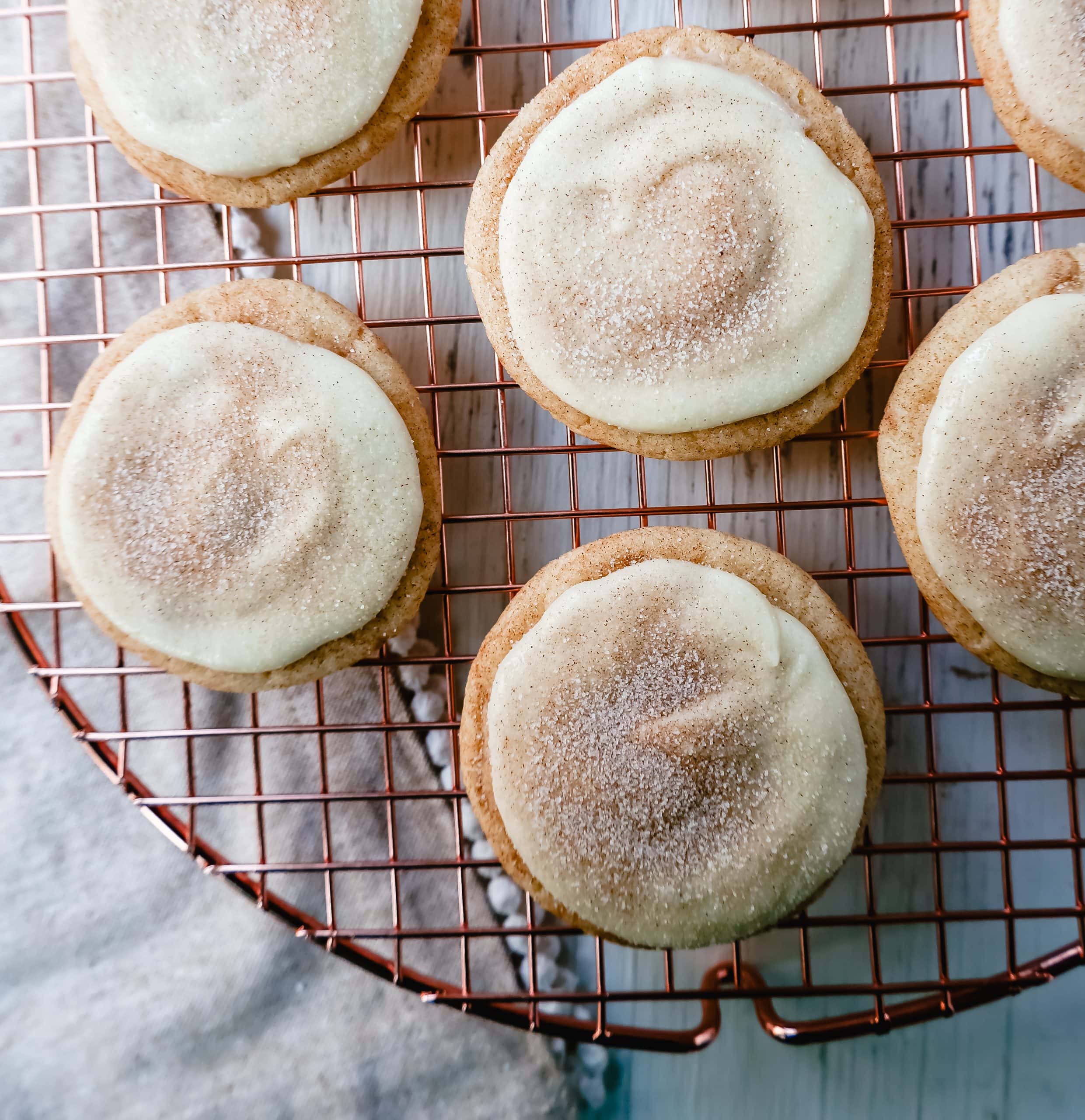 Frosted Snickerdoodle Cookies Soft, chewy cinnamon sugar snickerdoodle cookies topped with a sweet buttery cream cheese frosting and topped with a sprinkle of cinnamon sugar.