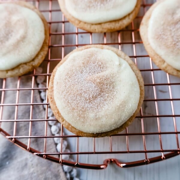 Frosted Snickerdoodle Cookies Soft, chewy cinnamon sugar snickerdoodle cookies topped with a sweet buttery cream cheese frosting and topped with a sprinkle of cinnamon sugar.