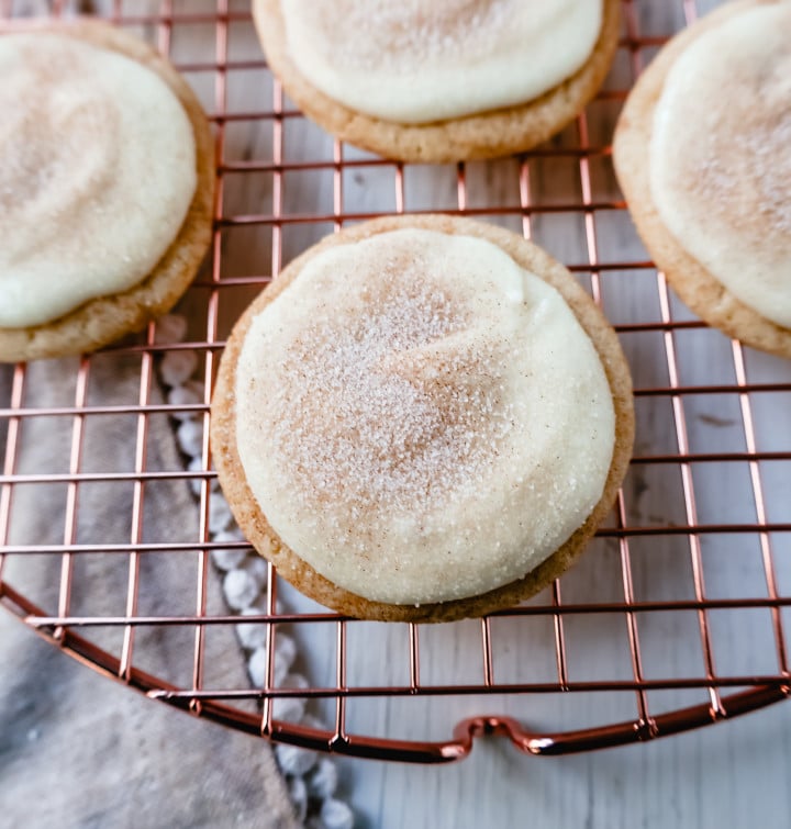 Frosted Snickerdoodle Cookies Soft, chewy cinnamon sugar snickerdoodle cookies topped with a sweet buttery cream cheese frosting and topped with a sprinkle of cinnamon sugar.