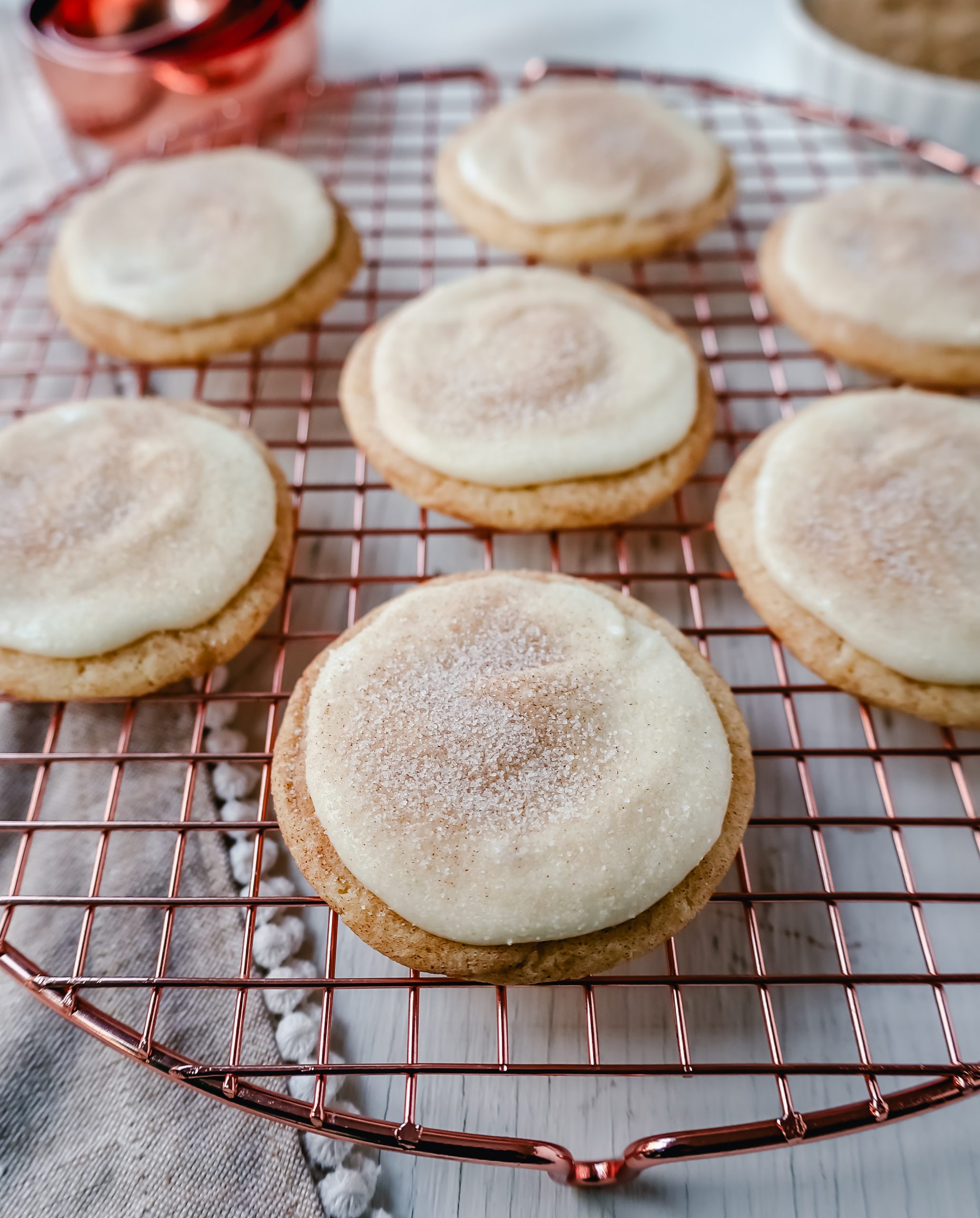 Frosted Snickerdoodle Cookies Soft, chewy cinnamon sugar snickerdoodle cookies topped with a sweet buttery cream cheese frosting and topped with a sprinkle of cinnamon sugar.