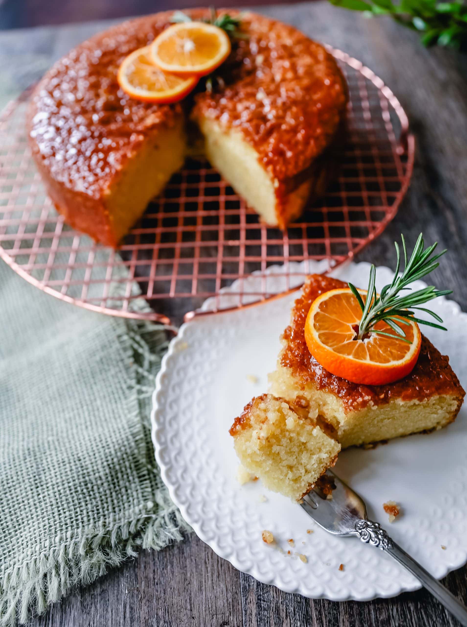 Olive Oil Cake A homemade olive oil cake with vanilla and almond extracts and topped with a glaze. This vanilla olive oil cake is the perfect simple dessert. 