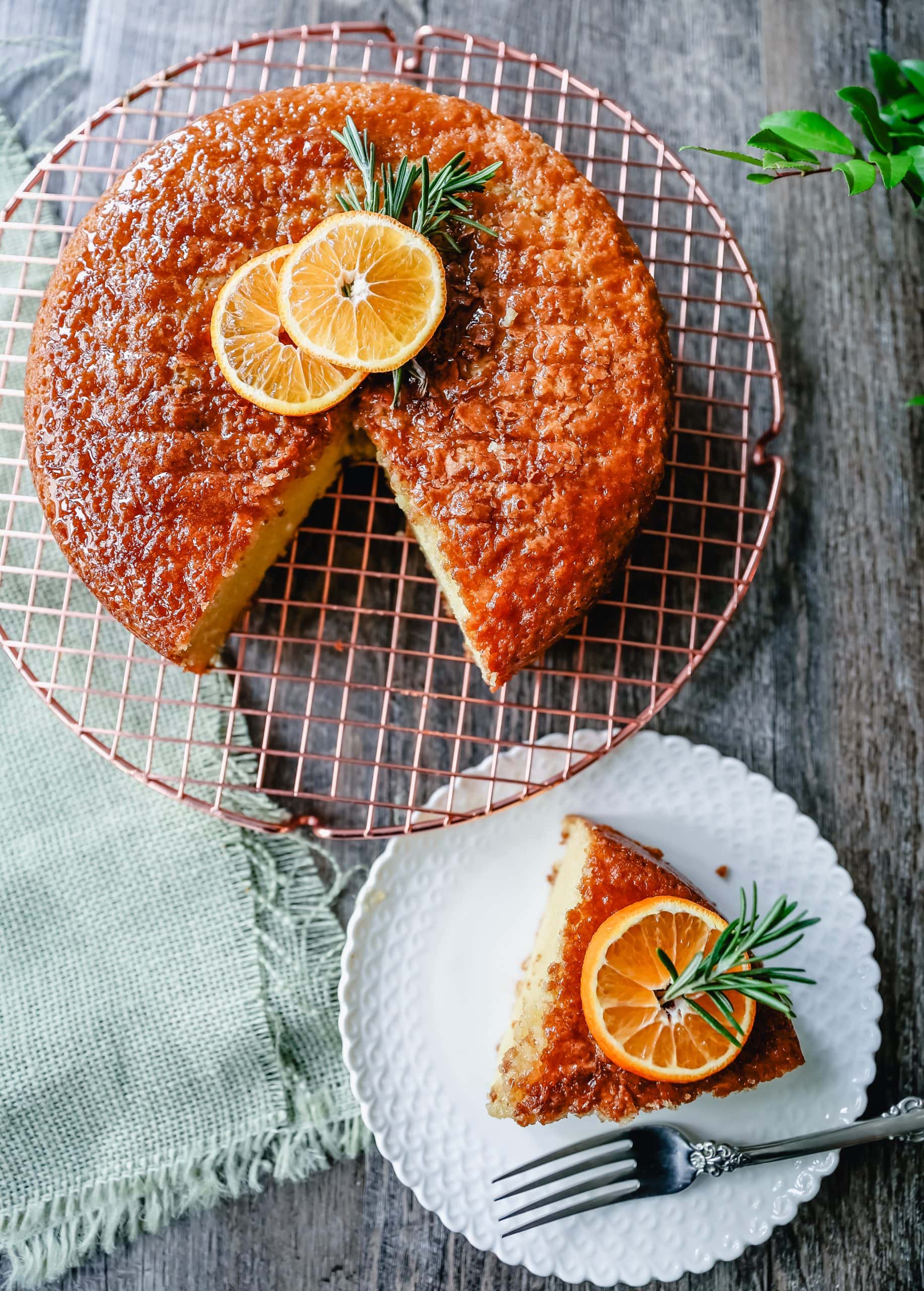 Olive Oil Cake A homemade olive oil cake with vanilla and almond extracts and topped with a glaze. This vanilla olive oil cake is the perfect simple dessert. 