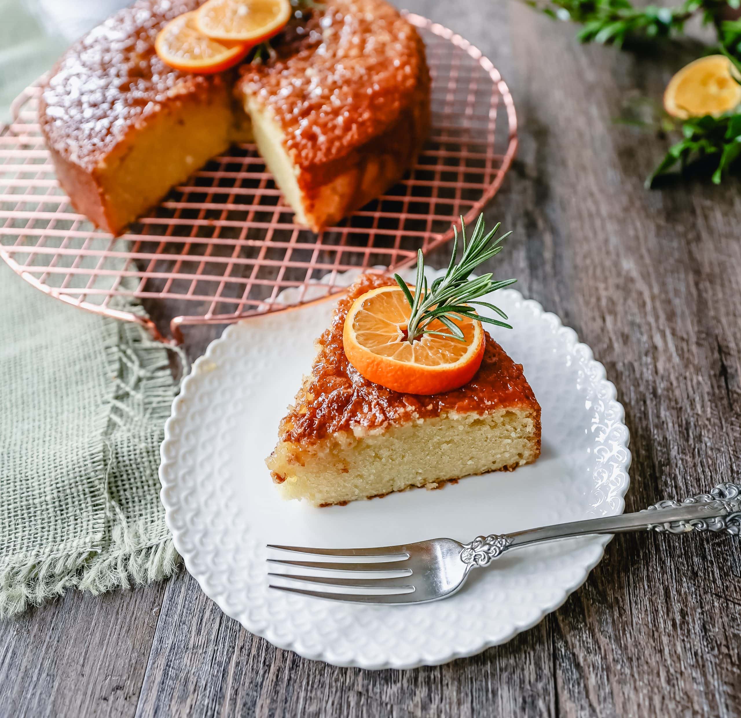 Olive Oil Cake A homemade olive oil cake with vanilla and almond extracts and topped with a glaze. This vanilla olive oil cake is the perfect simple dessert. 