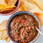 Easy Homemade Salsa made with tomatoes, cilantro, jalapeno, green chilies, green onions, and salt. This is the quickest homemade salsa and can be made in a blender in 5 minutes!