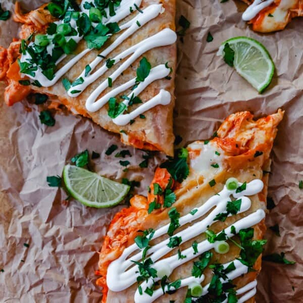 Buffalo Chicken Quesadilla is made with a hot wing buffalo ranch chicken and melted jack cheese in a buttery tortilla and cooked until golden brown. 