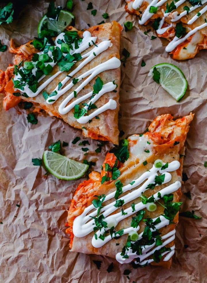 Buffalo Chicken Quesadilla is made with a hot wing buffalo ranch chicken and melted jack cheese in a buttery tortilla and cooked until golden brown.