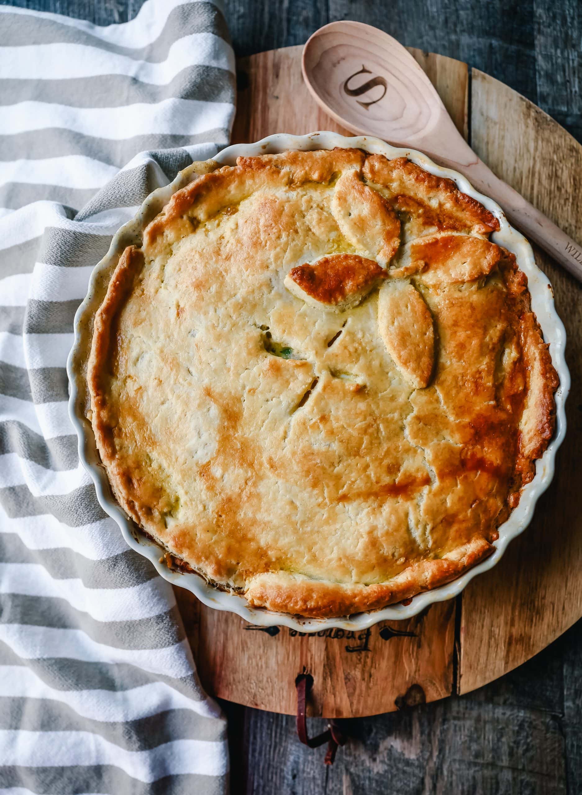 Chicken Pot Pie. Homemade Chicken Pot Pie made with a buttery, flaky homemade pie crust filled with a rich, creamy sauce filled with vegetables and tender chicken. The best comfort food dinner!