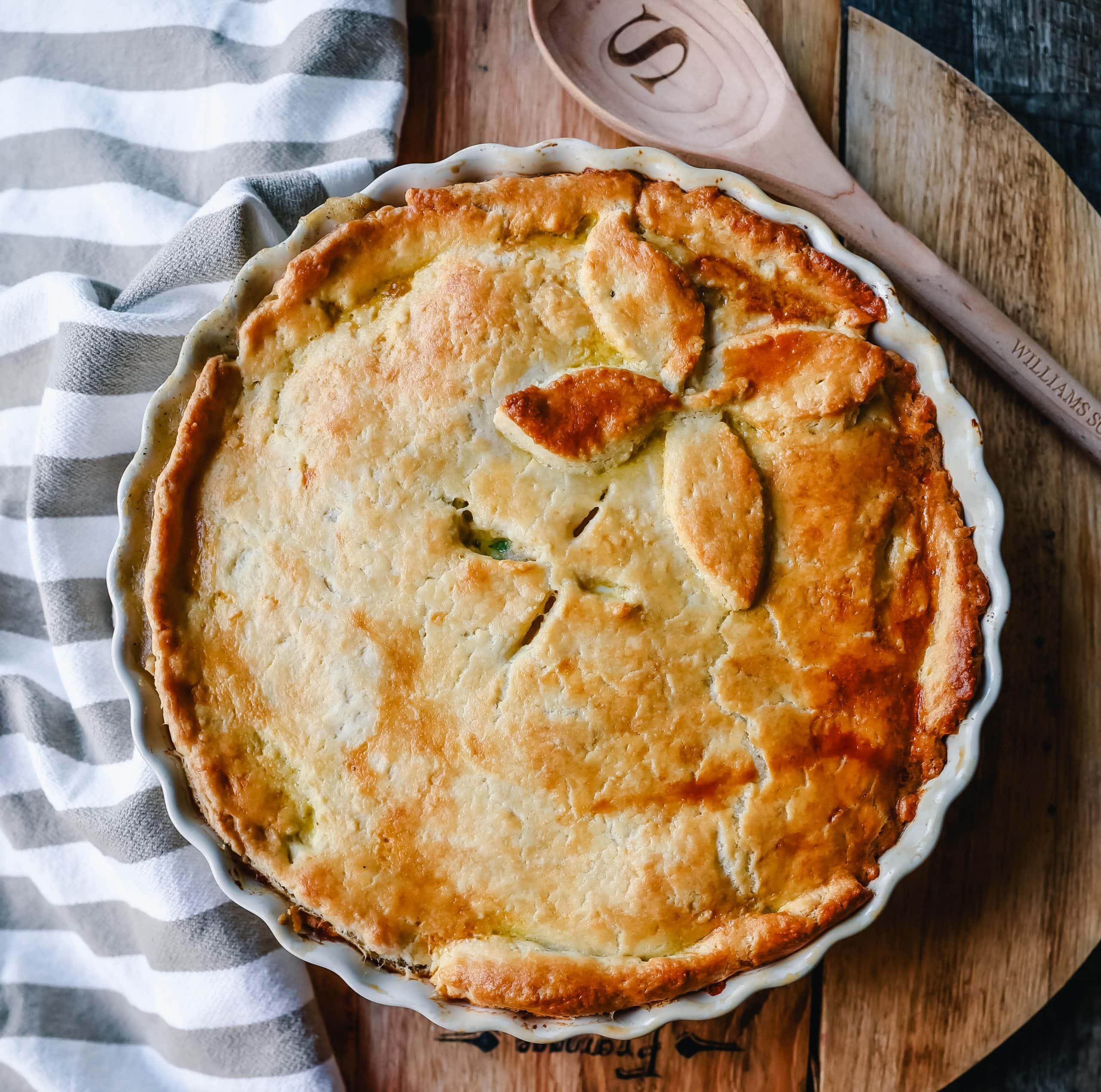 Chicken Pot Pie. Homemade Chicken Pot Pie made with a buttery, flaky homemade pie crust filled with a rich, creamy sauce filled with vegetables and tender chicken. The best comfort food dinner!