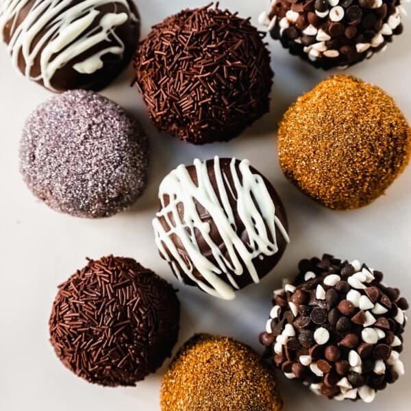 Chocolate Truffles. Rich, creamy, decadent homemade chocolate truffles made with high-quality chocolate, heavy cream, and a touch of butter rolled into your favorite toppings.