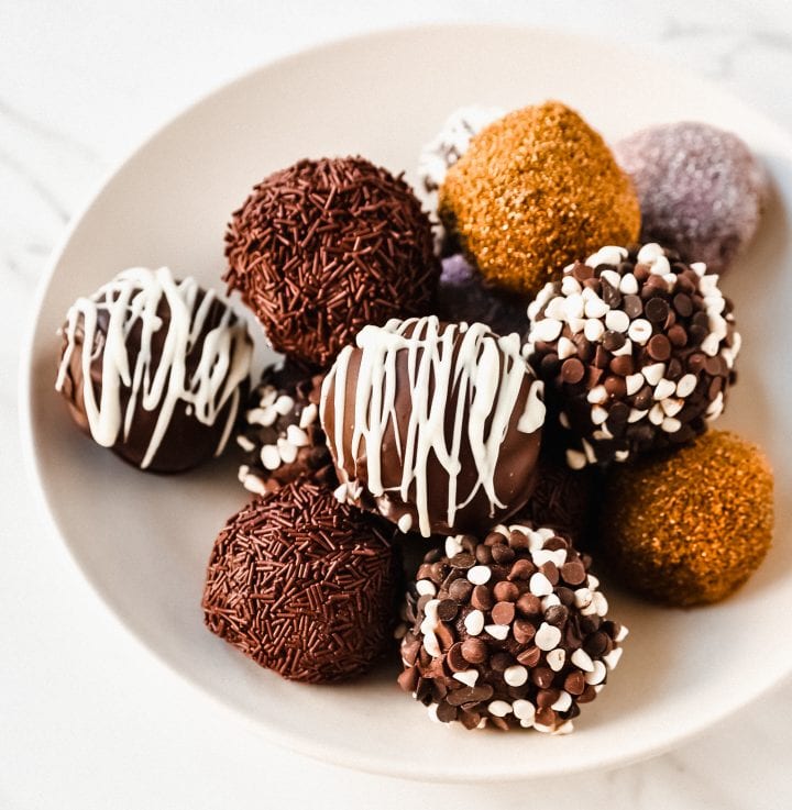 Chocolate Truffles. Rich, creamy, decadent homemade chocolate truffles made with high-quality chocolate, heavy cream, and a touch of butter rolled into your favorite toppings.