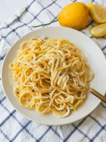 Creamy Lemon Pasta is made with fresh lemon, garlic, cream, butter, parmesan cheese, and spices and all tossed with your favorite type of pasta. A light and creamy sauce that highlights fresh lemons!