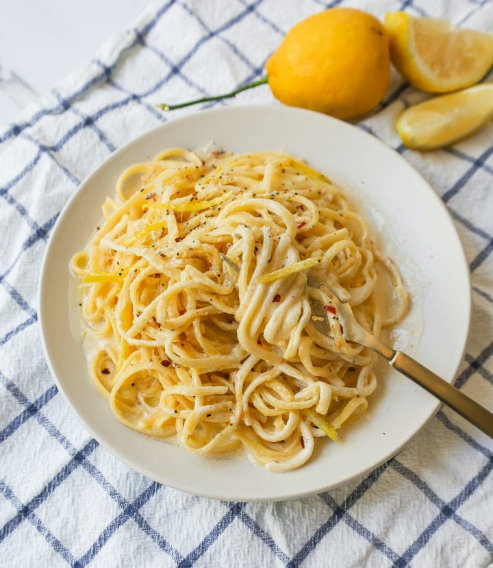 Creamy Lemon Pasta is made with fresh lemon, garlic, cream, butter, parmesan cheese, and spices and all tossed with your favorite type of pasta. A light and creamy sauce that highlights fresh lemons!